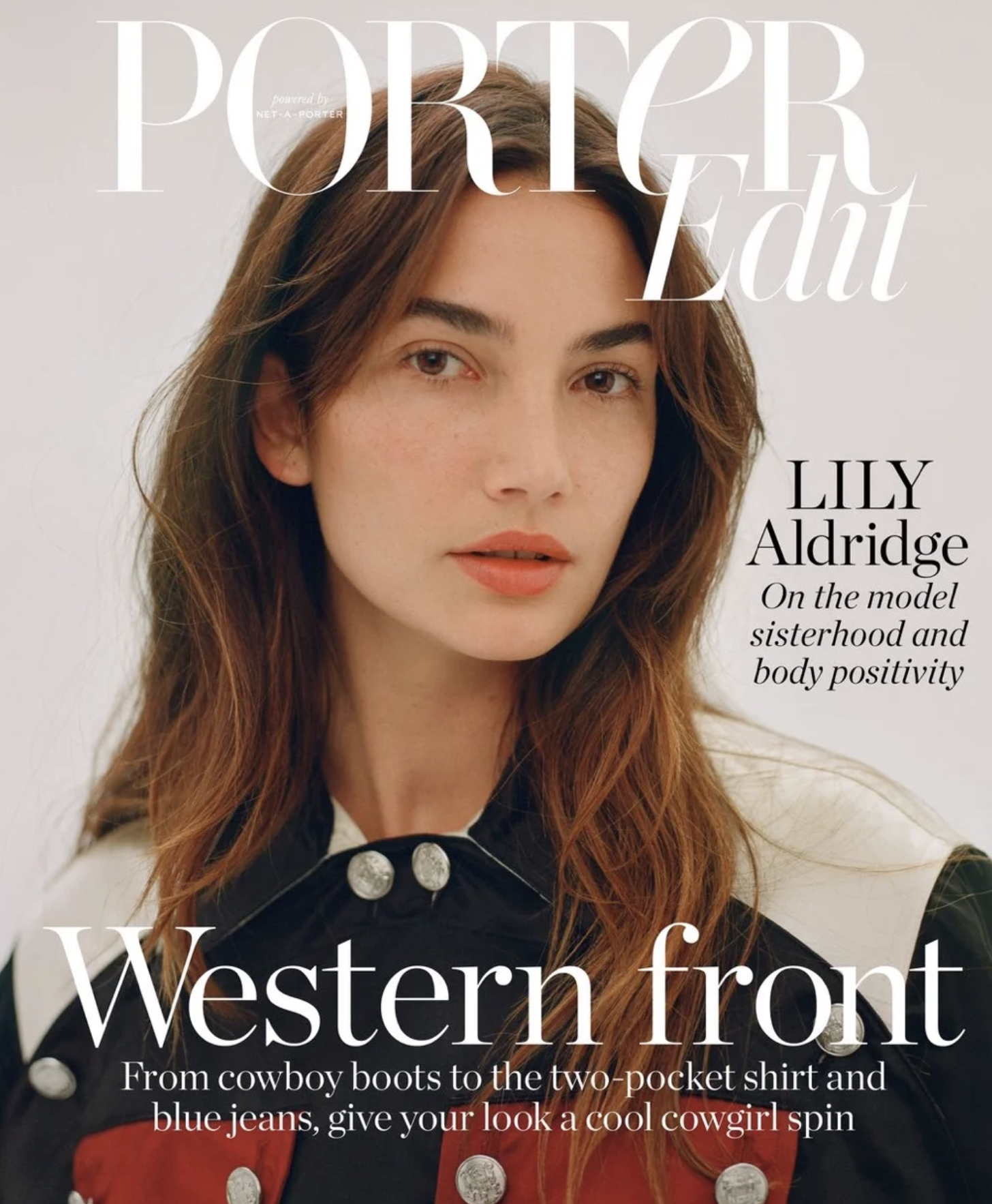 Magazine cover featuring a woman with long red hair, wearing a Western-inspired outfit with studded details and large silver buttons, with text about Western fashion trends.