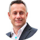 Smiling man in business suit against a dark background