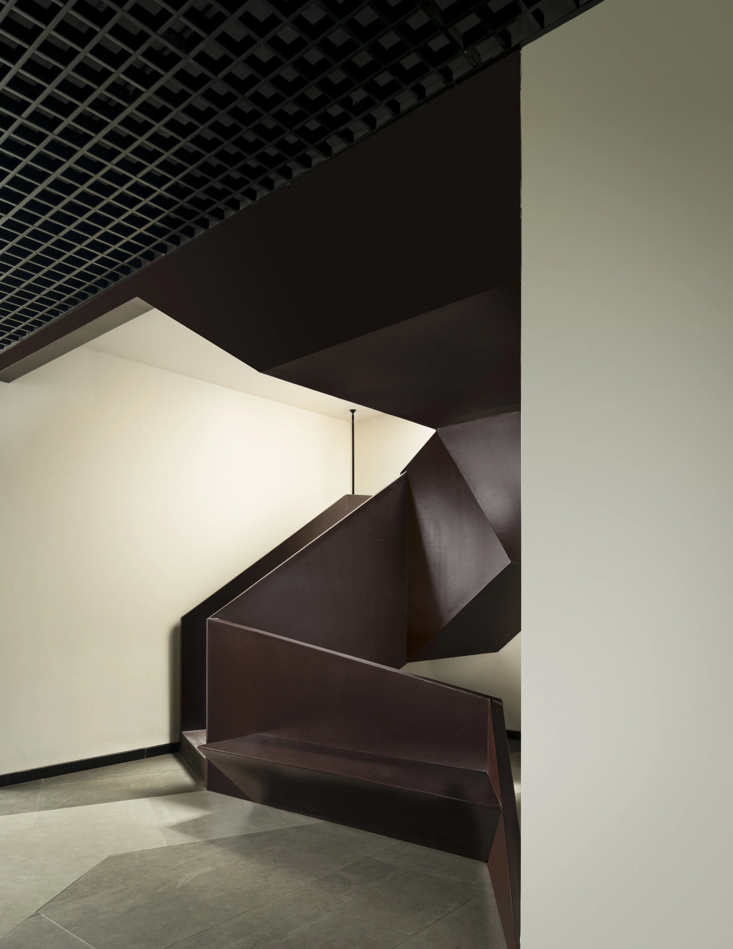 Ironside office in Bangalore: metal staircase and shared workstations