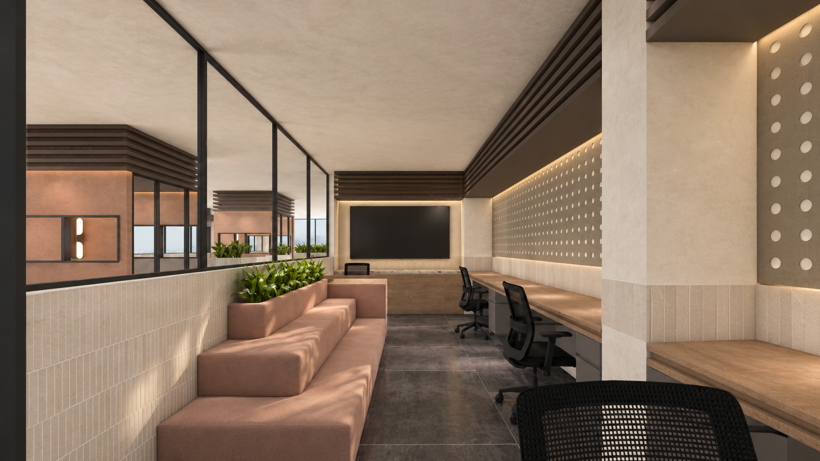 AWC in Noida: lounge bench beside desks and a perforated screen