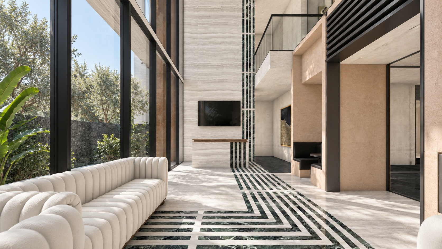 AWC in Noida: double height lounge with white sofas and patterned flooring