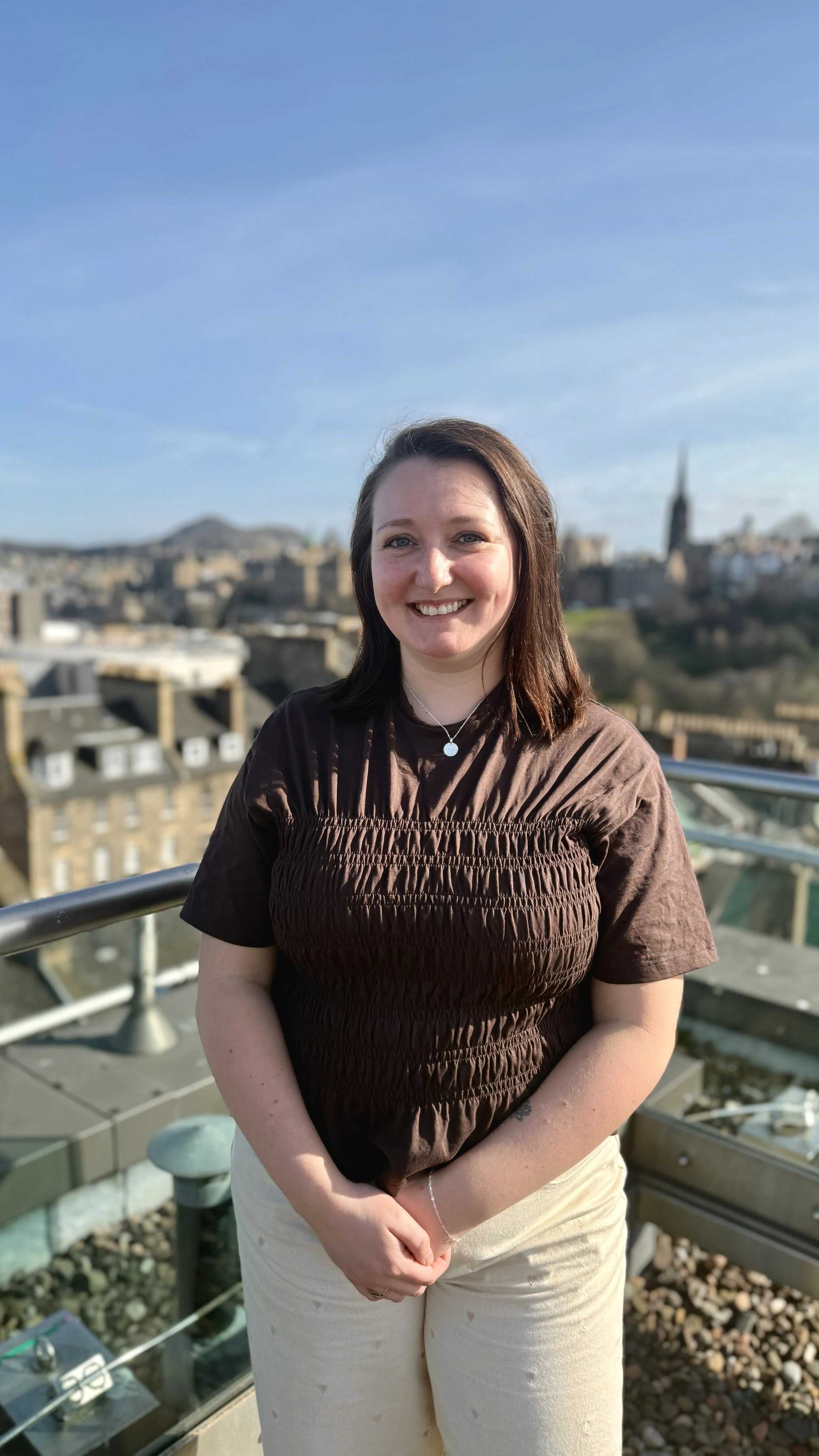 Image of Linsay Brown against Edinburgh backdrop