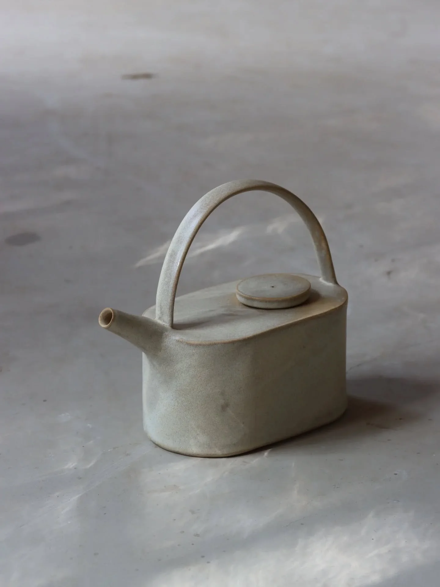 This teapot was made partly by hand-building and partly thrown on the wheel. When it first came out of the kiln after the bisque firing, I wasn&rsquo;t sure how I felt about the shape. But after some time, and especially once it was glazed, it has be