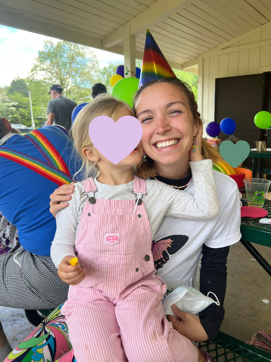 ab-smiling-big-with-kiddo-at-birthday-party-wearing-party-hat