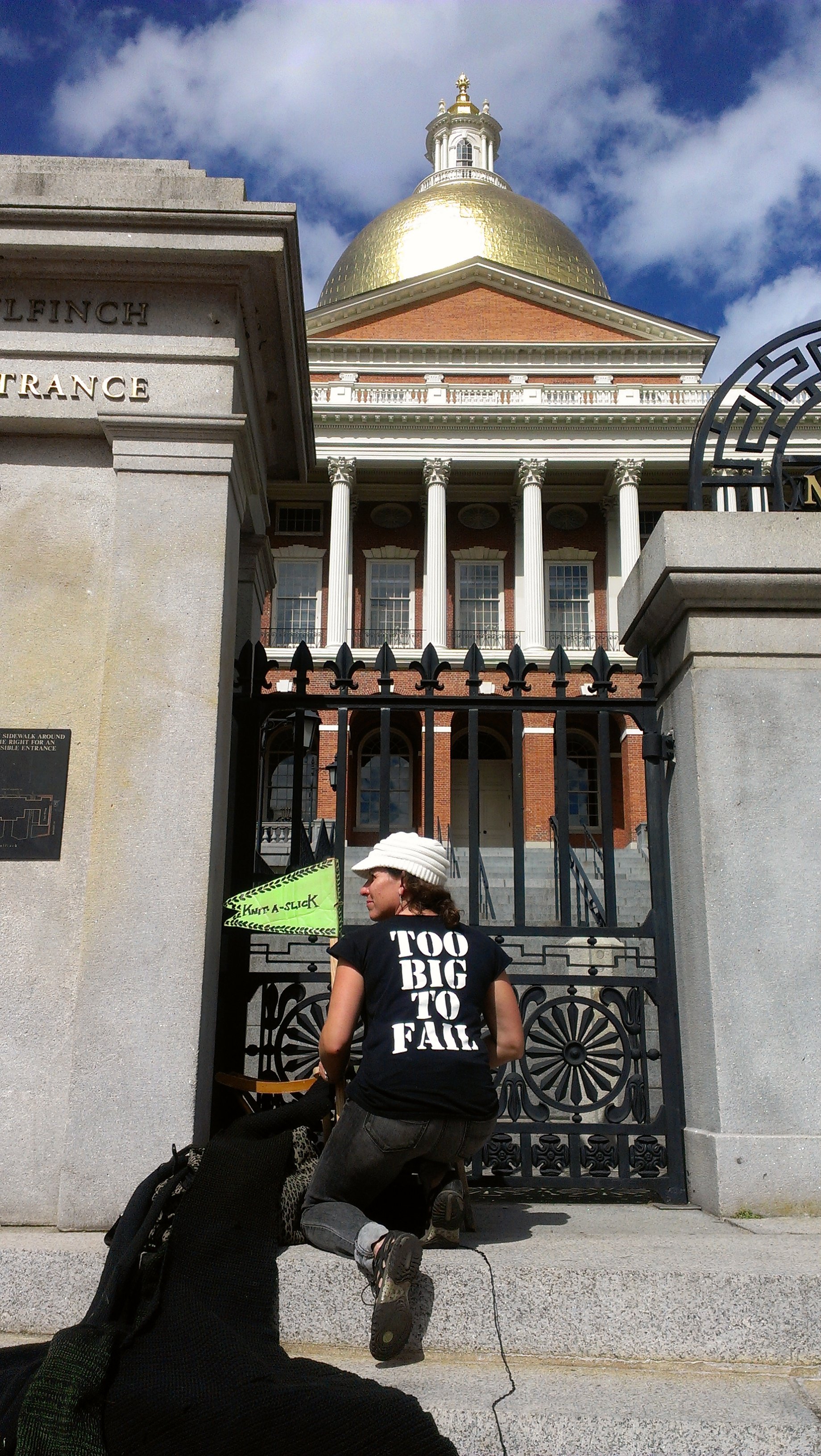 State House 350 Protest
Boston MA 2013.

The Knit-a-slicK is a call to action, an intervention, a soft, cozy handmade response to an issue of  globalized and mechanized eco-deterioration.  It is hardware and software.  It is a collective action, and 