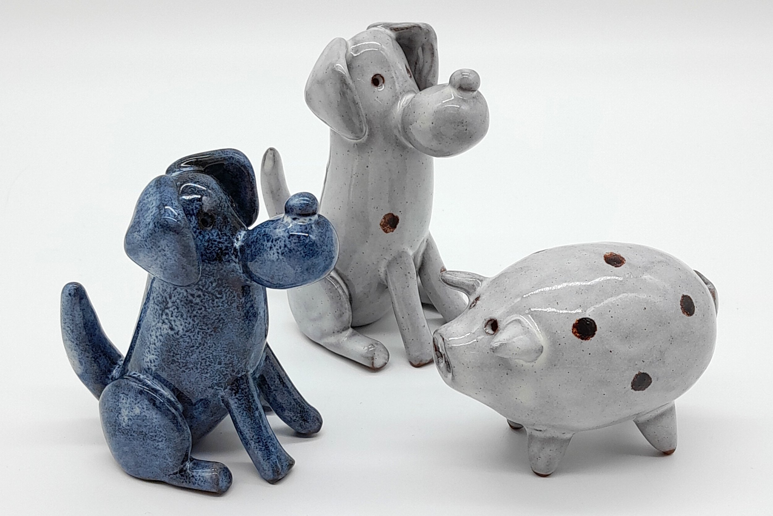 Buy handmade pottery figurines of dogs, cats, pigs, elephants