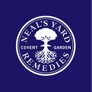 Neal's Yard Remedies logo with a tree, text, and a circular design on a dark blue background.