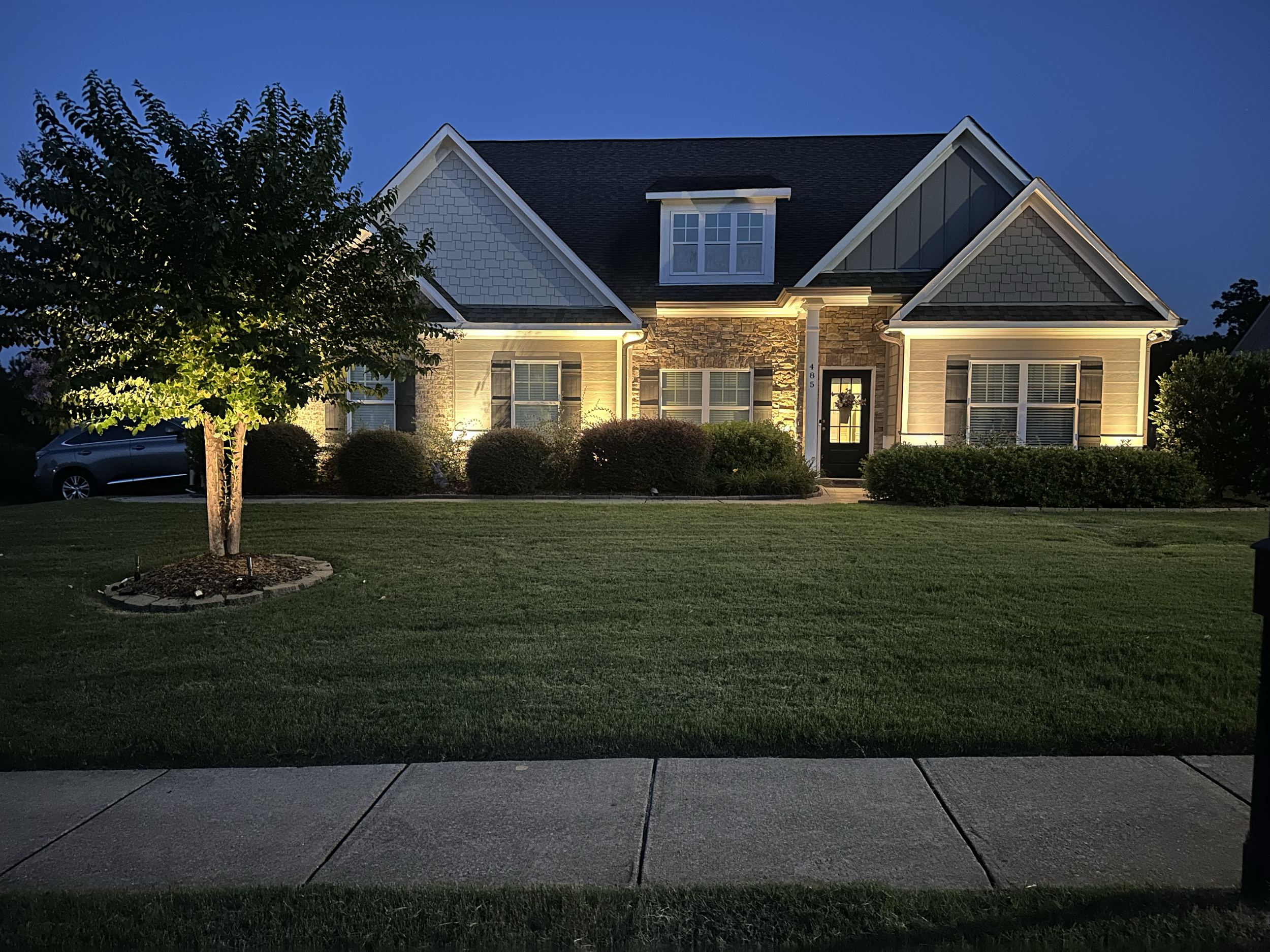 Permanent house lights. Outdoor light fixtures. Outdoor lighting installation