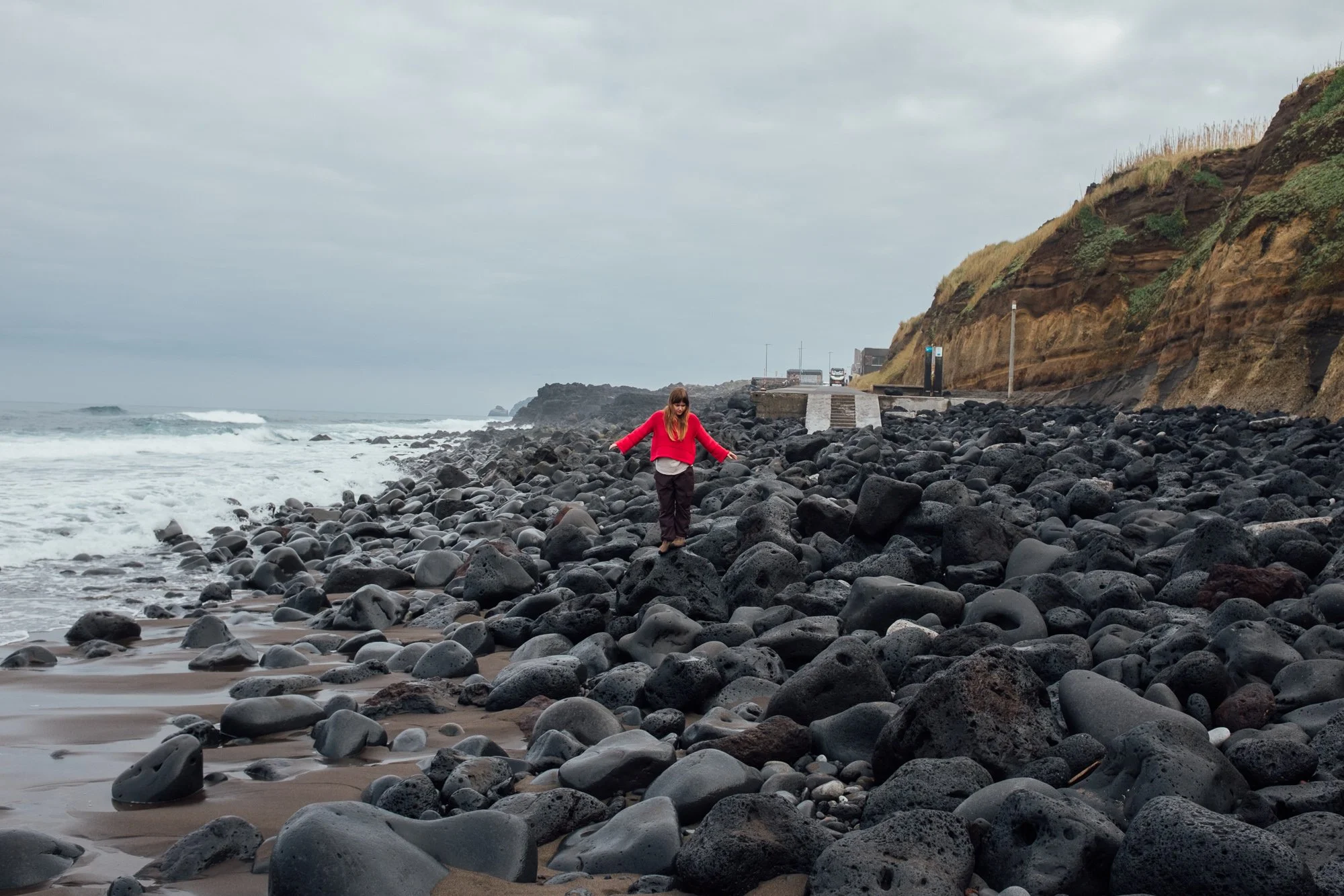 Praia do Areal de Santa Bárbara. Black-sand with rolling Atlantic waves, popular with surfers.