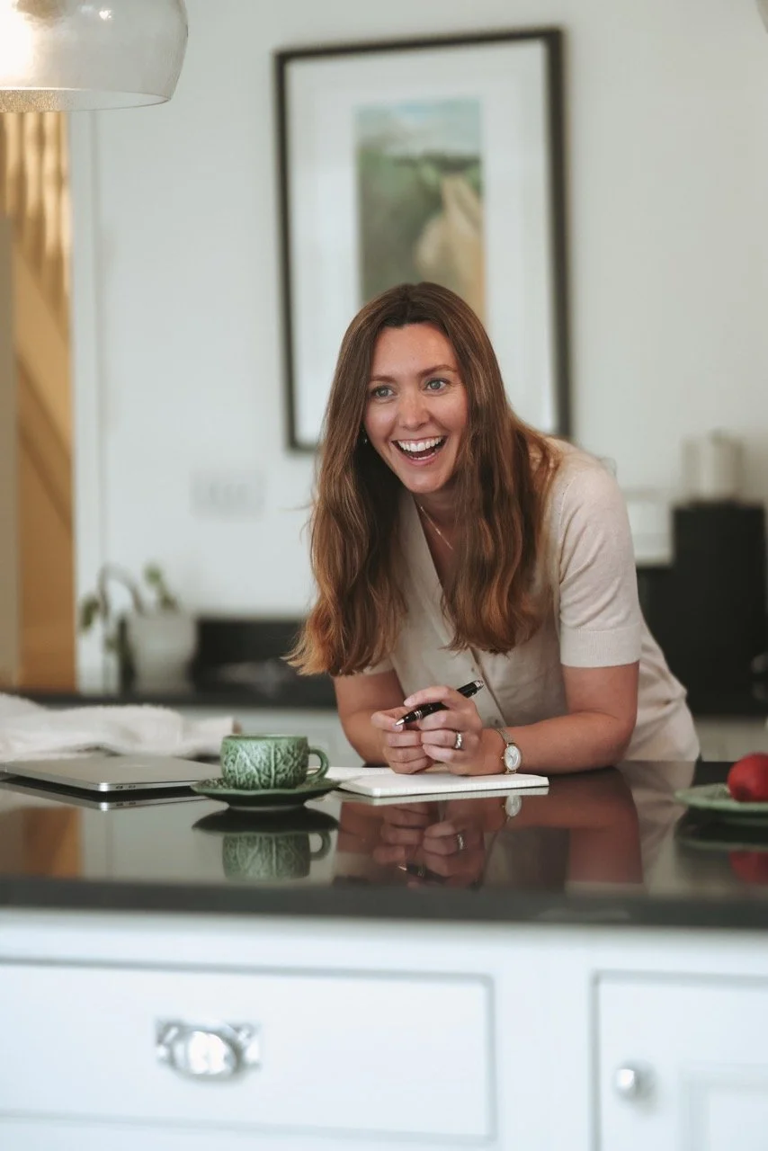 Becky Lacey, the founder of Joyfully Honest laughing and smiling, embracing the joys of life.