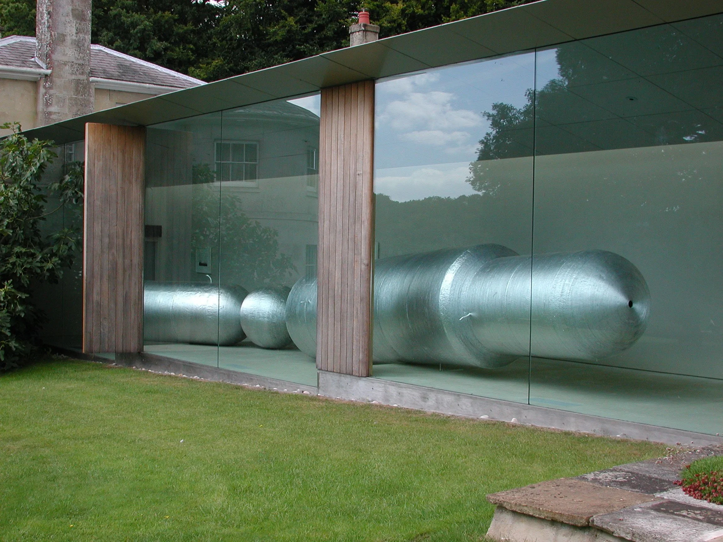  
DAPHNE WRIGHT  These Talking Walls, 2001    Tinfoil, fibreglass, audio and 4 photopolymer intalgio plates  