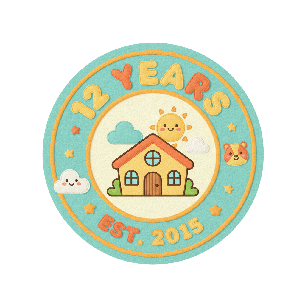 A colorful badge celebrating a 12-year anniversary, with a central illustration of a house, sun, clouds, a bear face, and smiling clouds, surrounded by the text "12 Years" and "Est. 2015".