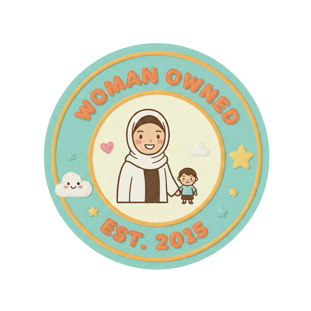 An embroidered patch with a cartoon illustration of a woman wearing a hijab holding a child, surrounded by stars, hearts, and clouds. The patch reads 'Woman Owned' at the top and 'Est. 2015' at the bottom, with a light blue background and orange, yellow, and white accents.