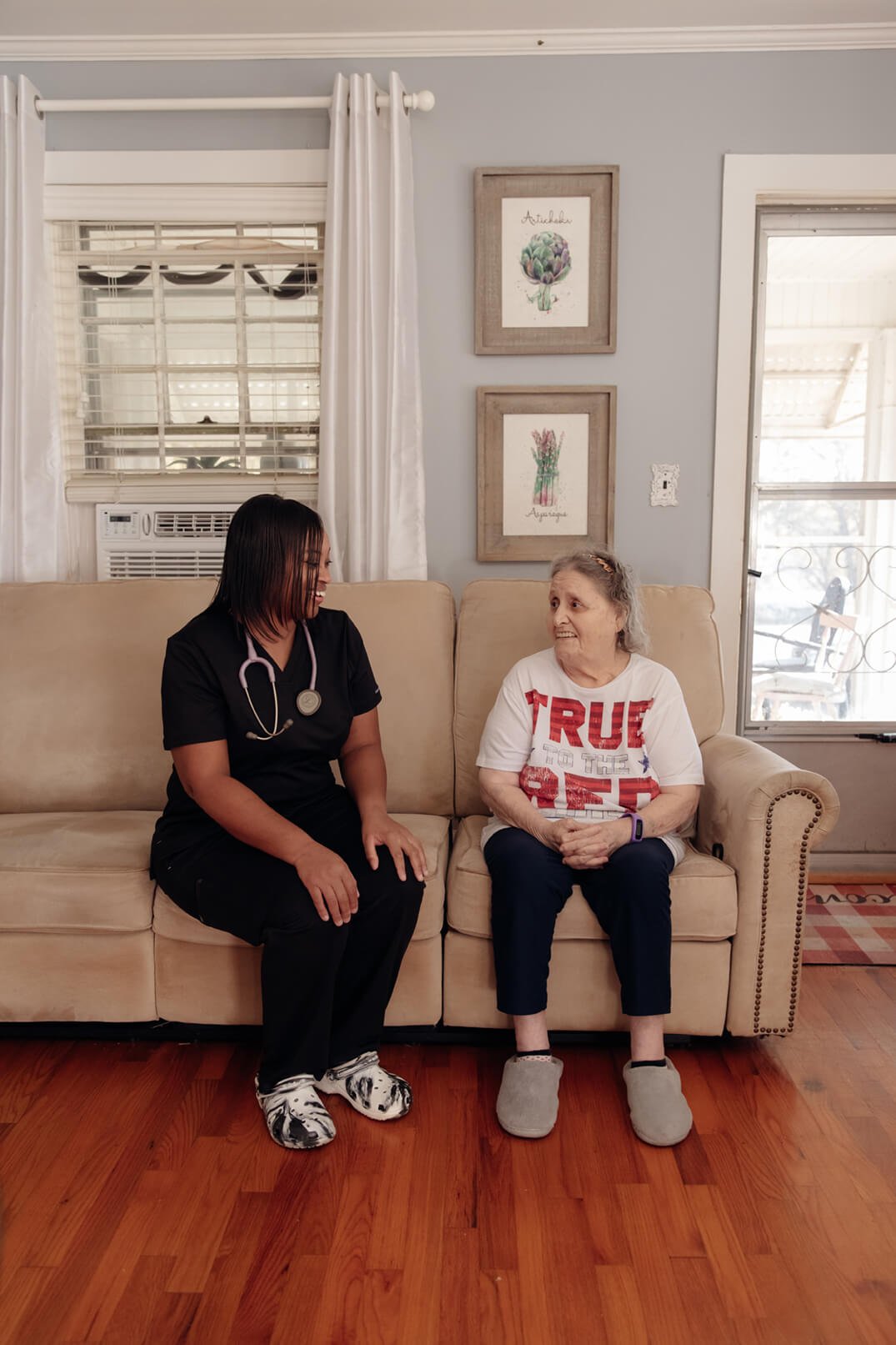 in-home caregiver from well care at home with patient