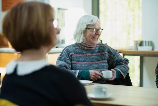 family members talking in kitchen about in-home care