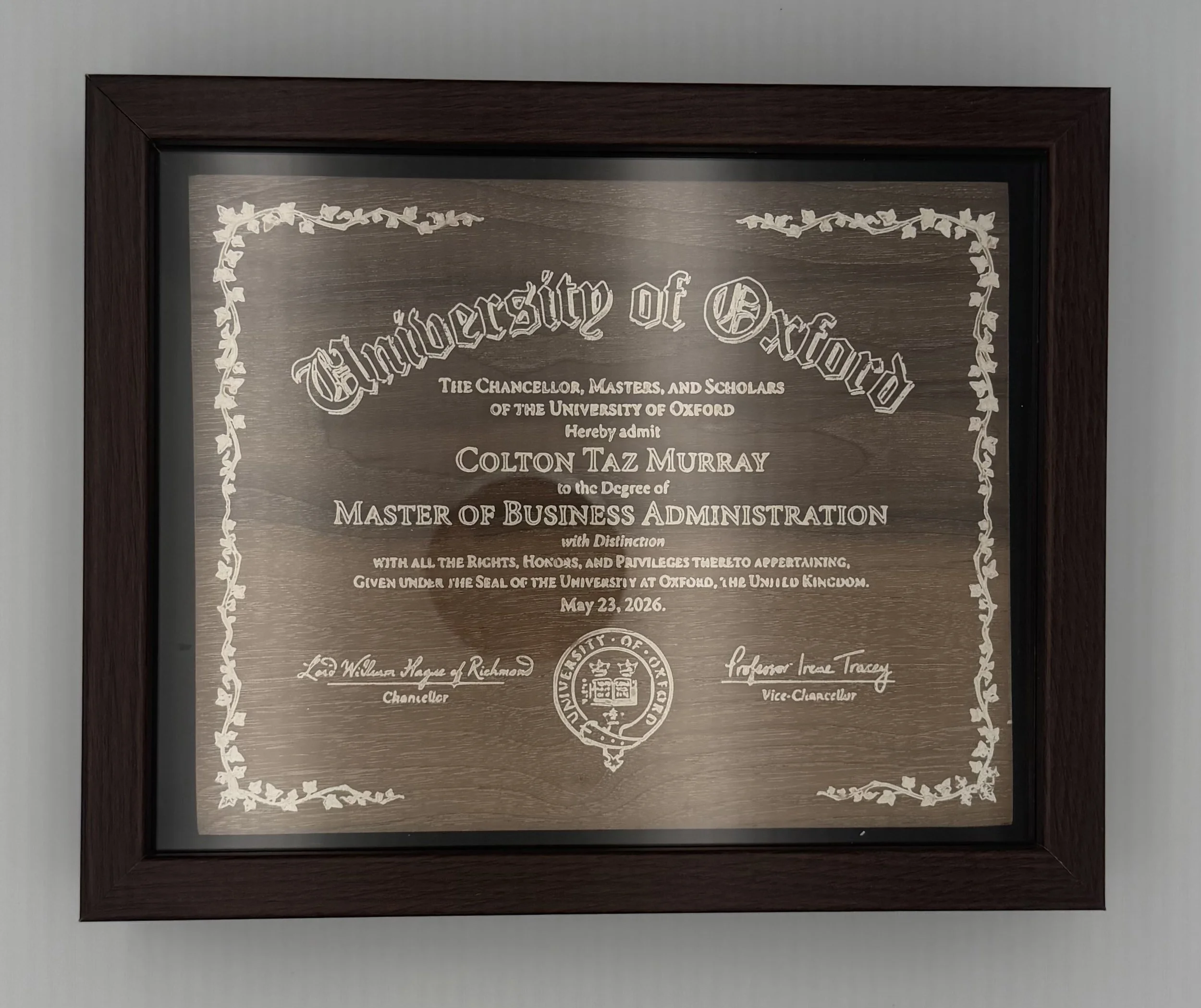 Framed academic diploma from the University of Oxford, issued to Colton Taz Murray for a Master of Business Administration degree, dated May 23, 2026.