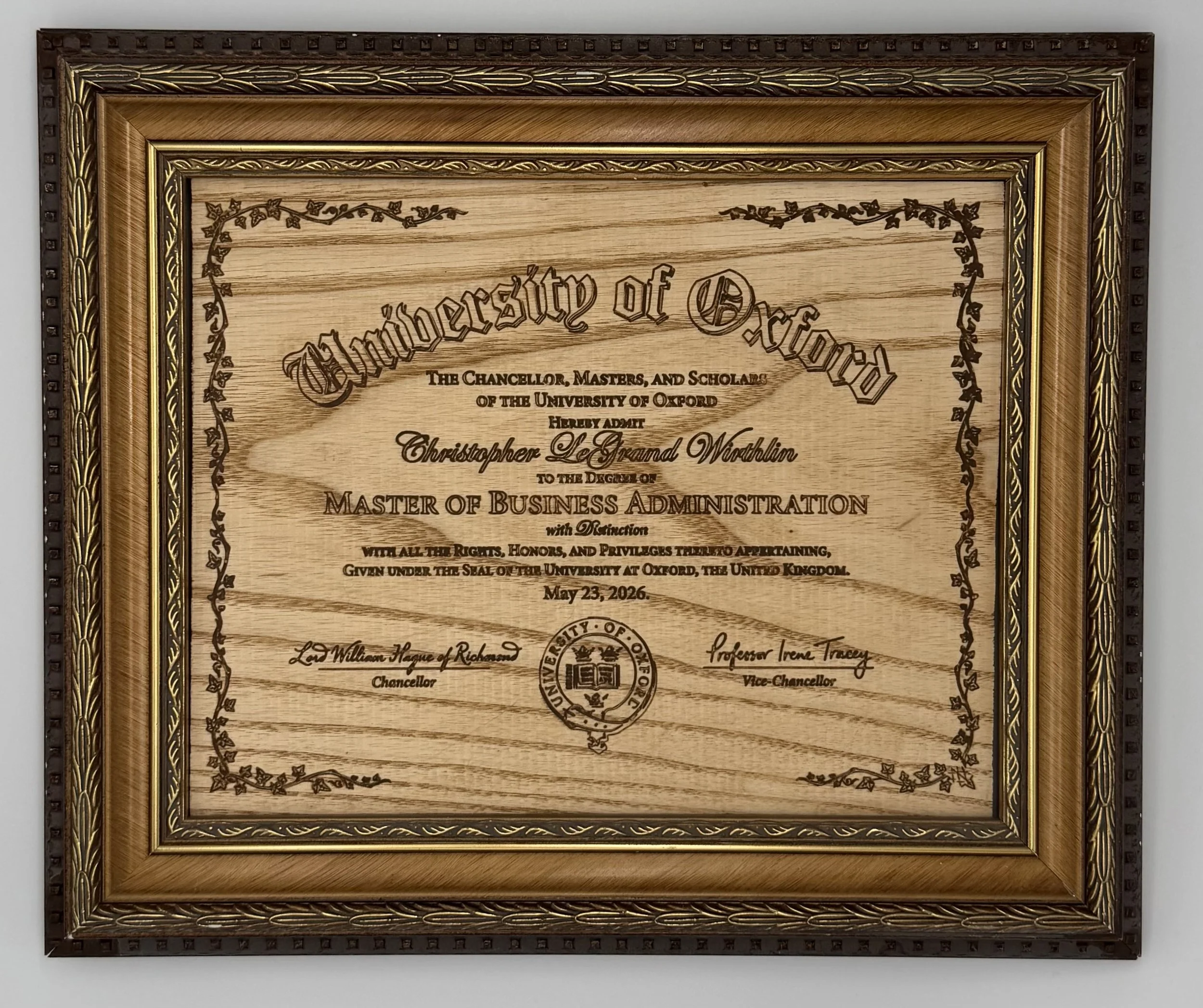 Wooden framed certificate from the University of Oxford for Christopher L. Ground Worthlin, awarded a Master of Business Administration degree, dated May 23, 2026.