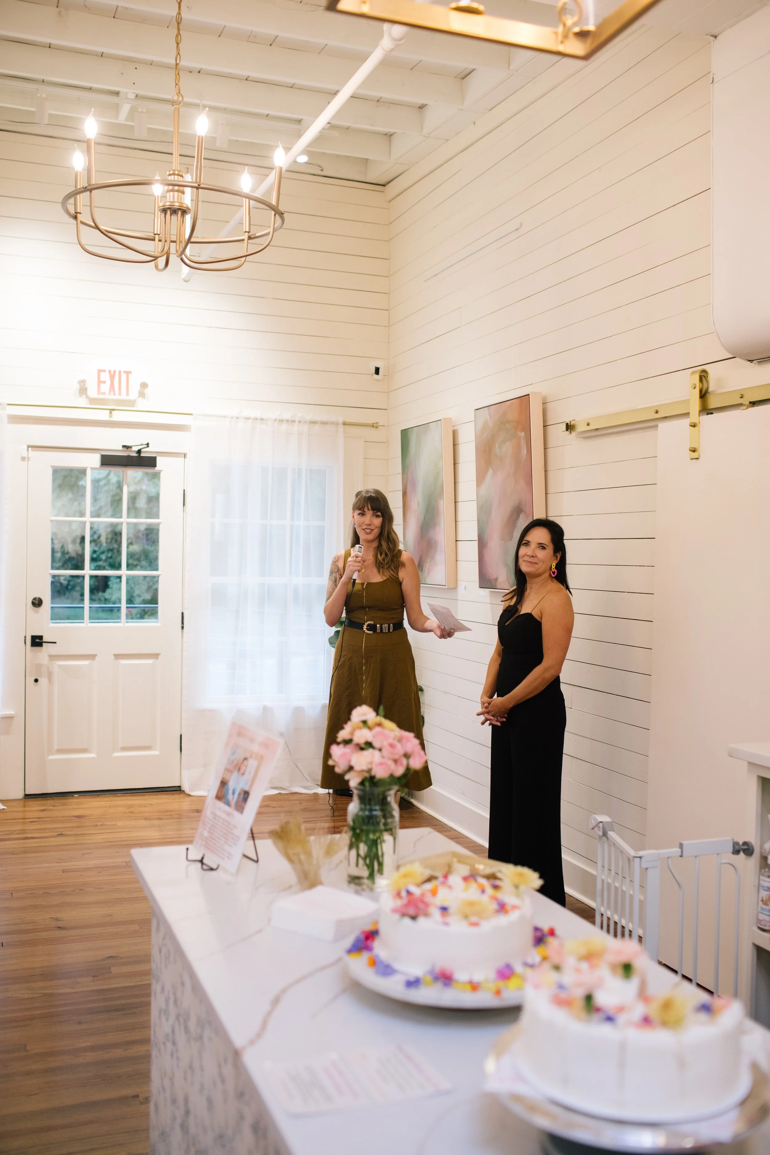 City Lead speaking at a Mom League Winston-Salem event inside The Reverie event space.