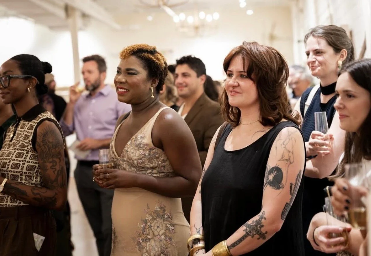 Attendees listening during a Mom League workshop event in Winston-Salem, focused on supporting moms and families.