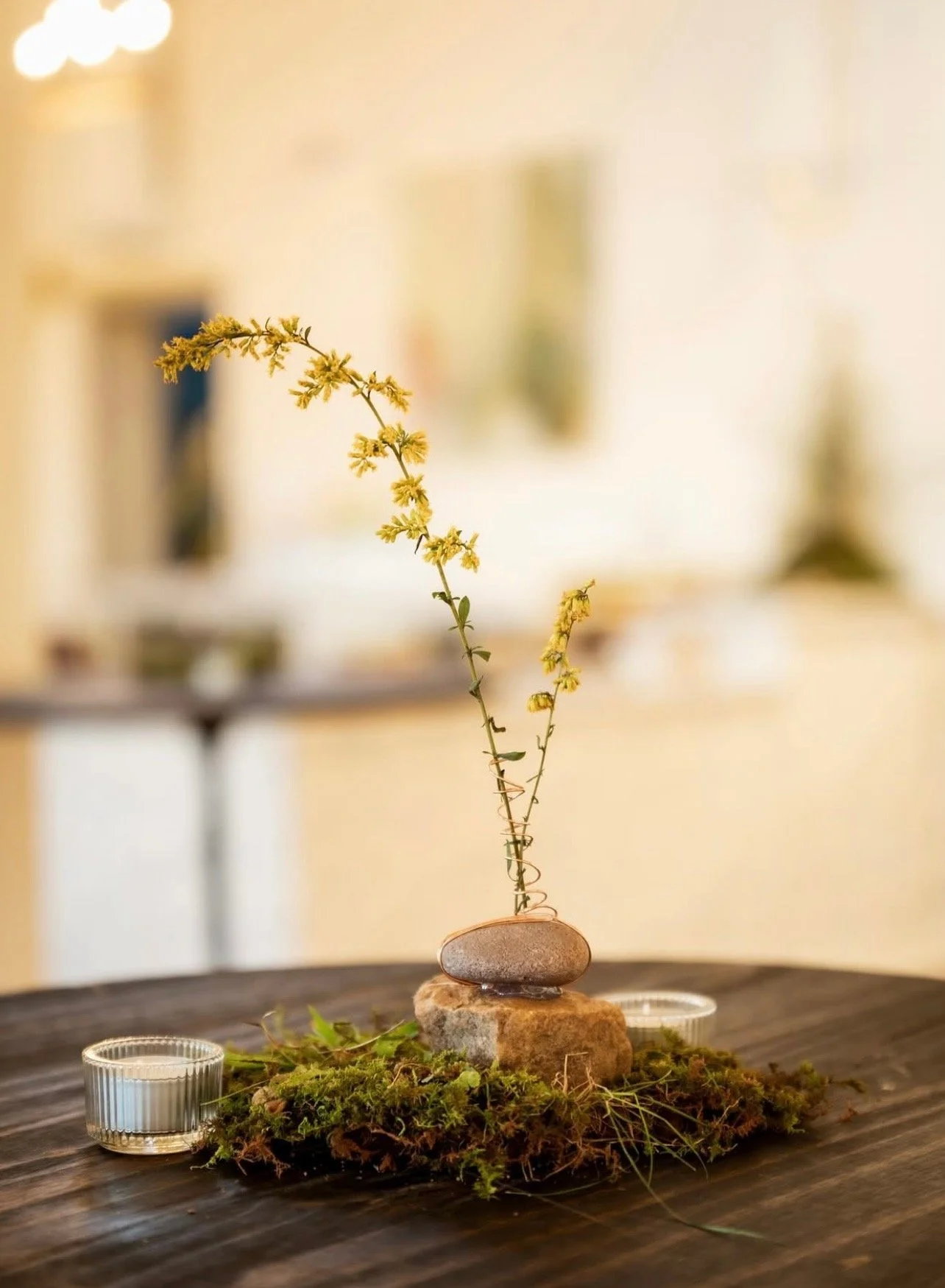 Styled floral and decor details inside The Reverie event space in Winston-Salem.