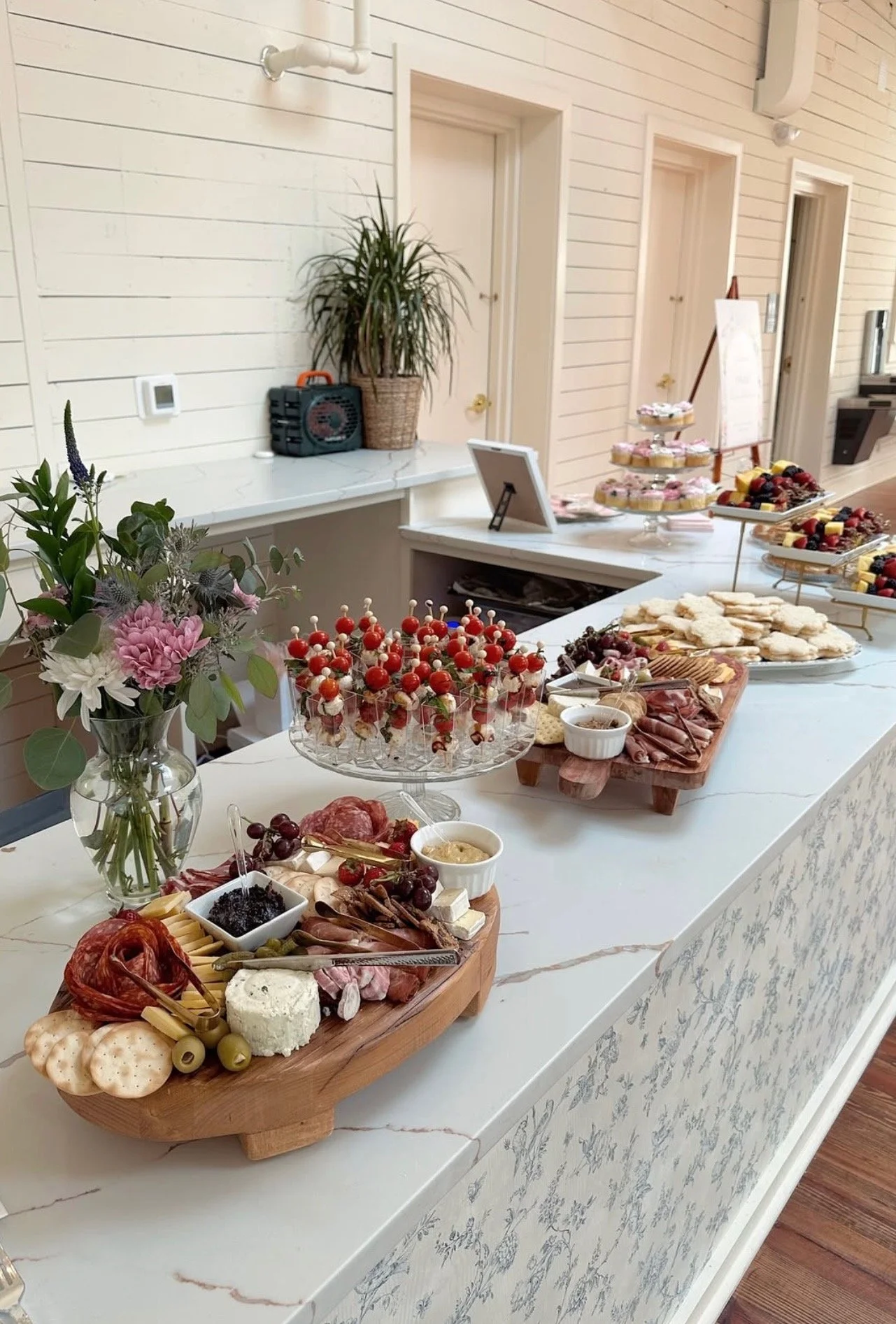Styled grazing table set up for a Mom League event at The Reverie in Winston-Salem, NC.