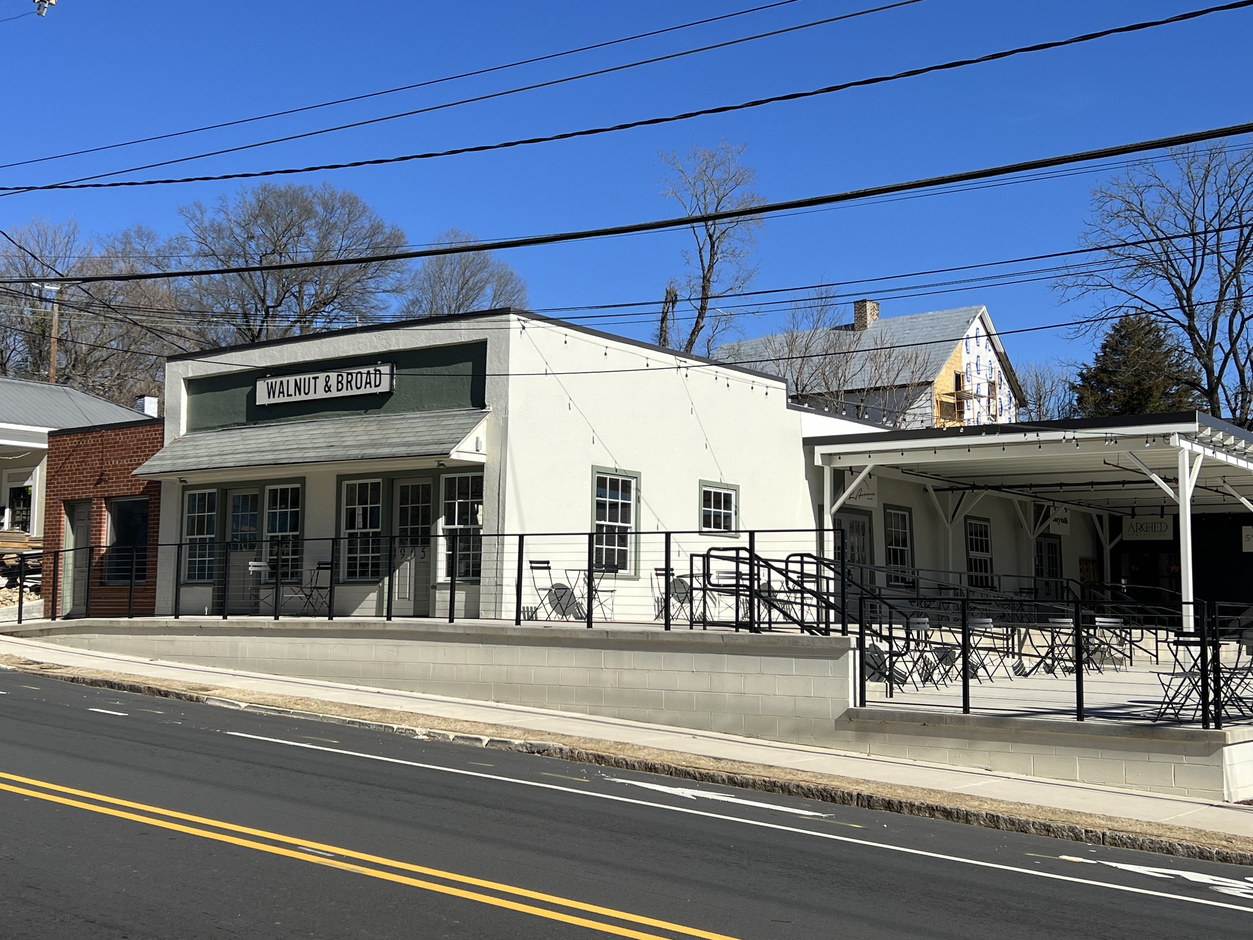 Exterior of Walnut & Broad in Winston-Salem, home to The Reverie event space and Mom League gatherings.