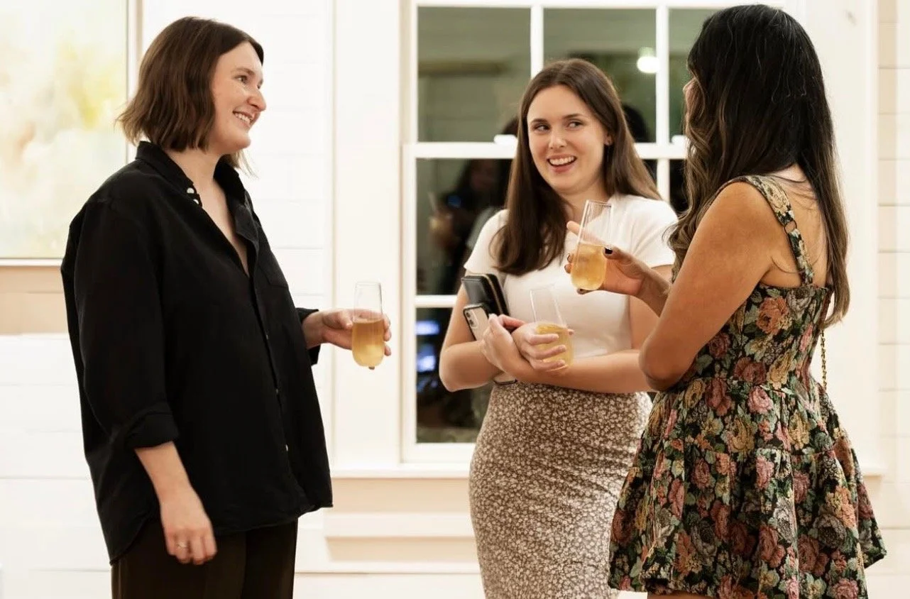 Moms connecting and building friendships at a Mom League community gathering in Winston-Salem.