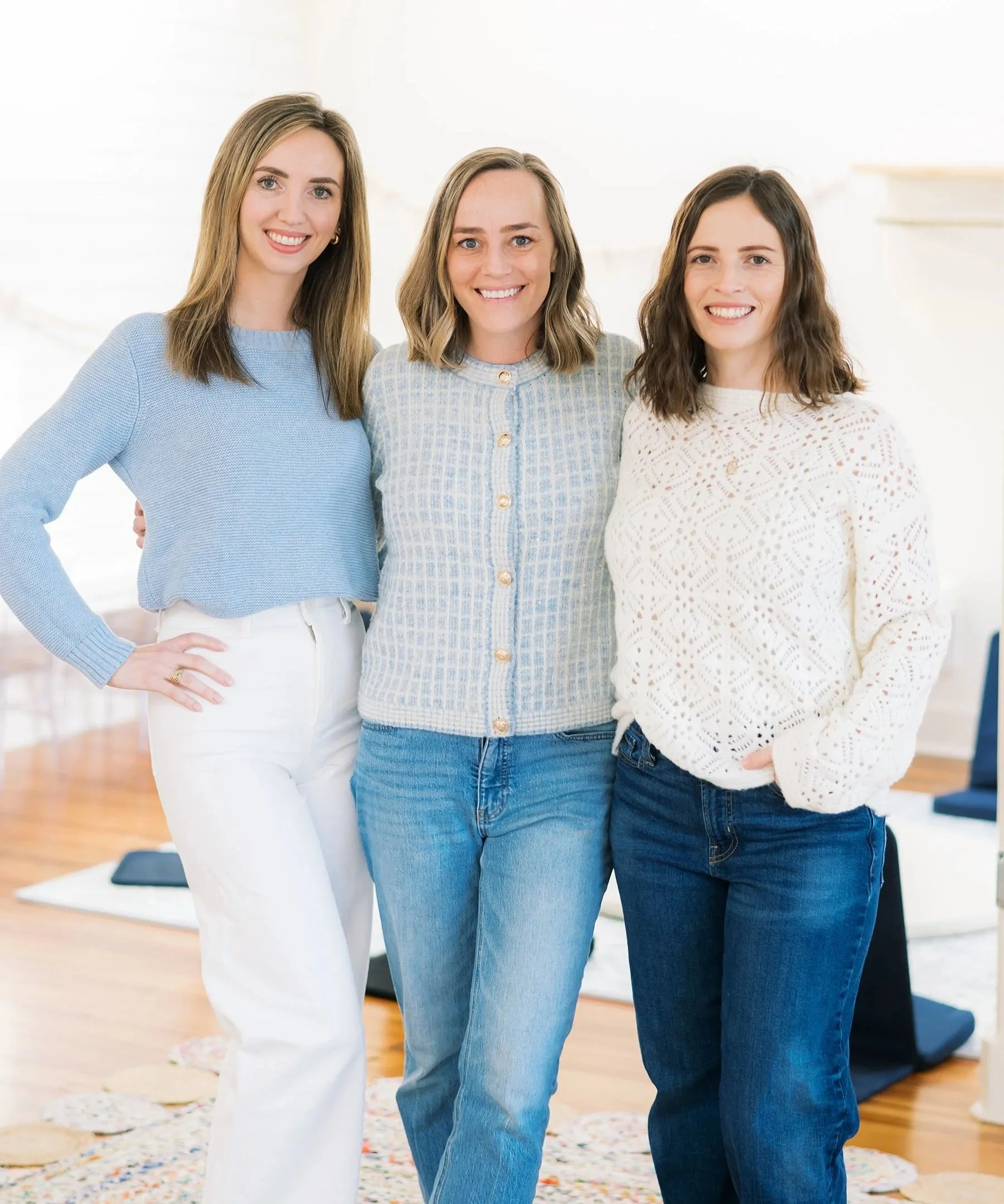 Mom League leadership team inside The Reverie in Winston-Salem, welcoming families to the Newborn Series.