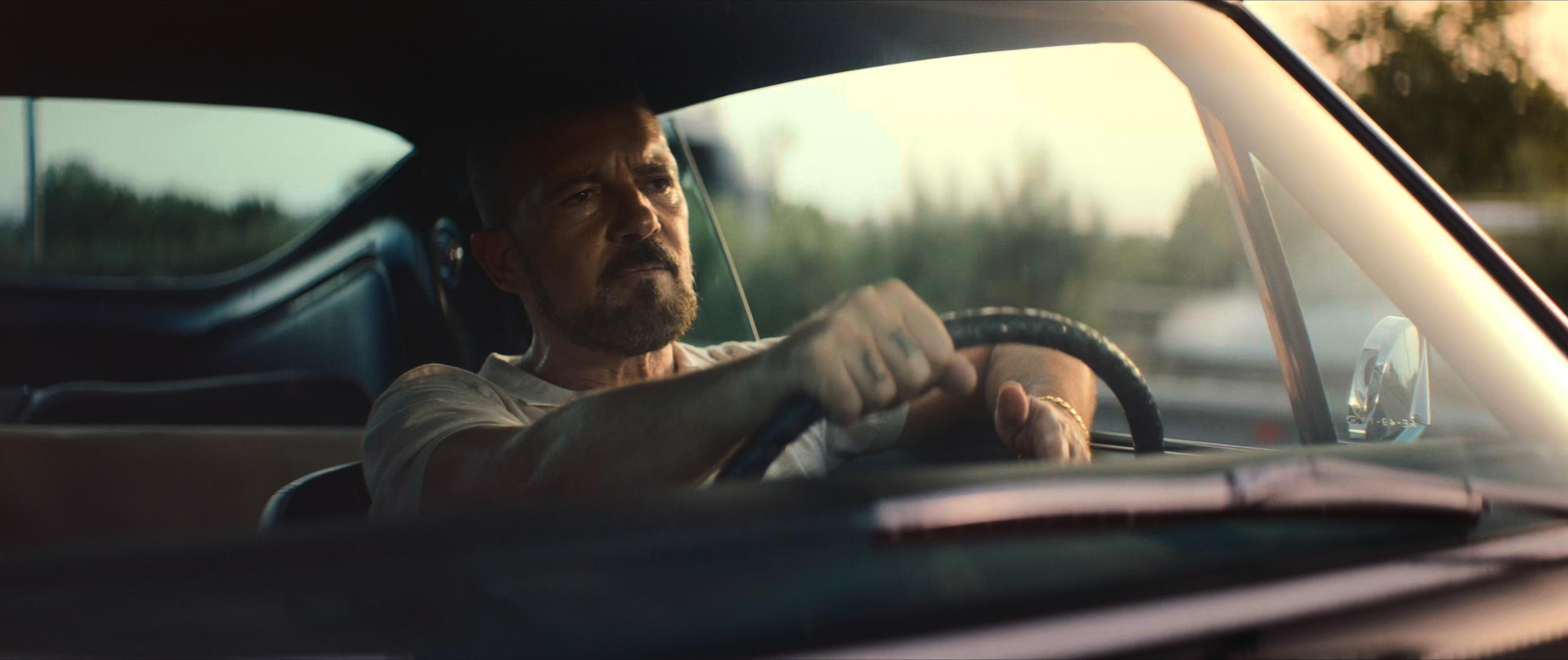 Antonio Banderas driving a Barracuda car in the movie The Enforcer, cinematography by Callan Green ACS NZCS