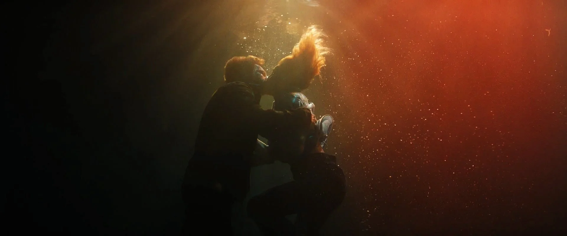 Bob Odenkirk and Connie Nielsen underwater in Nobody 2, filmed on location in Winnipeg, Canada, with cinematography by Callan Green ACS NZCS.
