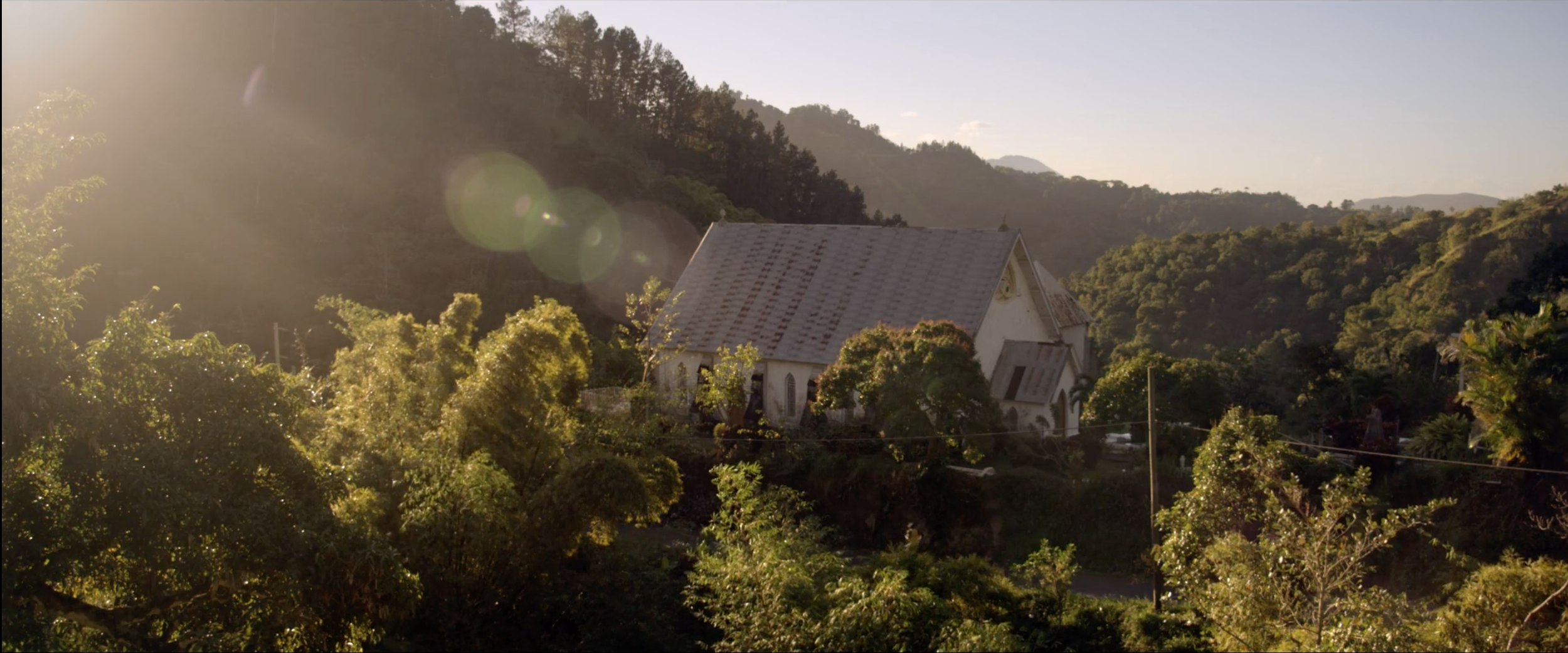 Playful and colourful image from a Gibson Headphones commercial starring Usain Bolt filmed by cinematographer Callan Green ACS NZCS in Jamaica.