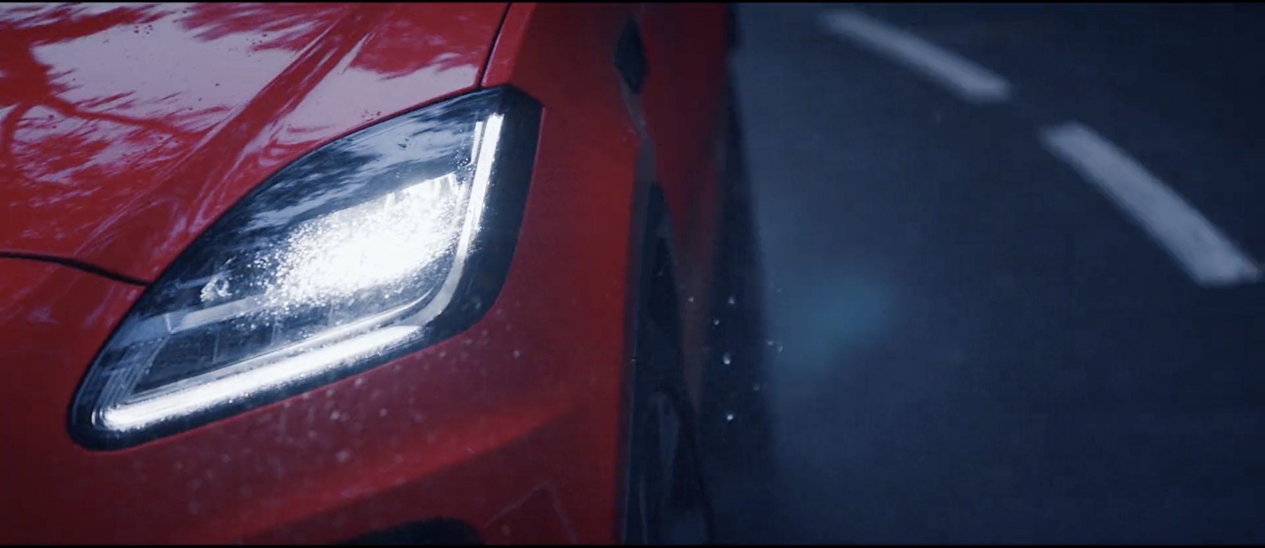 Stylish image of a red Jaguar E-PACE in a commercial filmed on location in Tenerife by cinematographer Callan Green ACS NZCS
