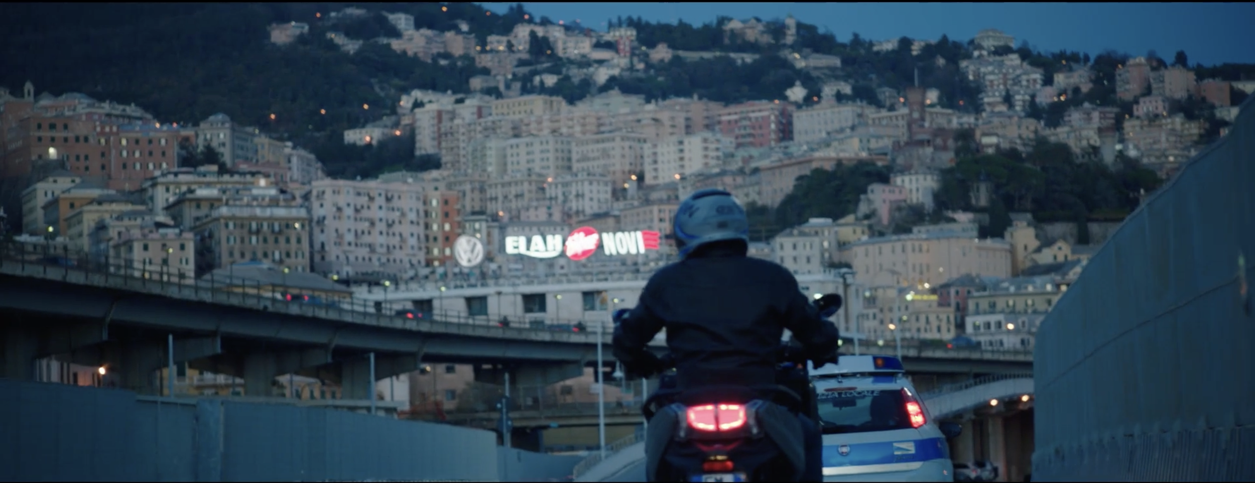 Stylish image of a man riding his motorbike in a BMW Motorrad commercial, filmed on location in Genoa, Italy, with cinematography by Callan Green ACS NZCS