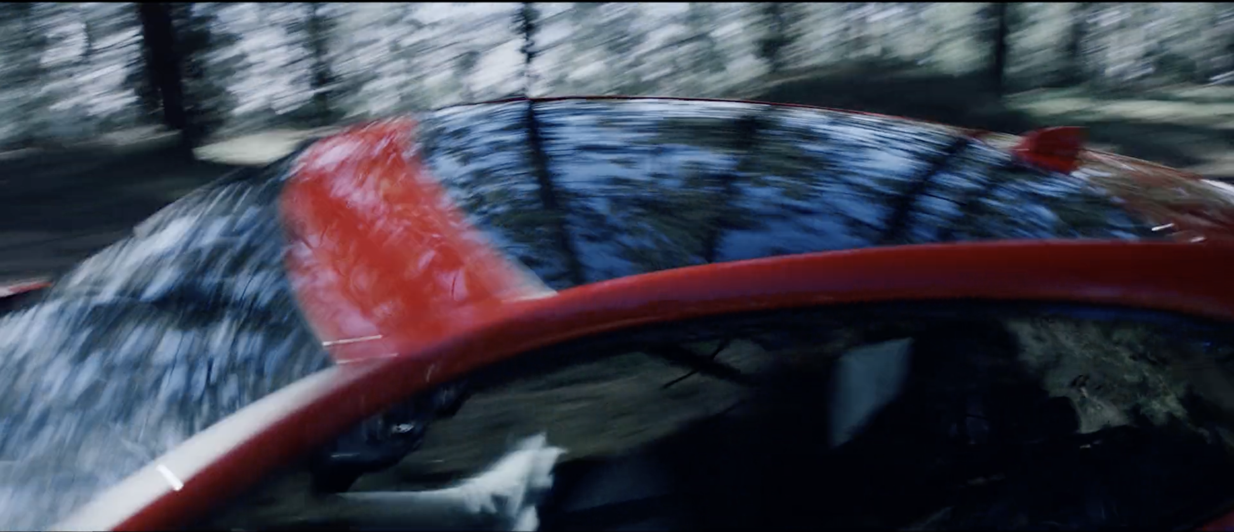 Stylish image of a red Jaguar E-PACE in a commercial filmed on location in Tenerife by cinematographer Callan Green ACS NZCS