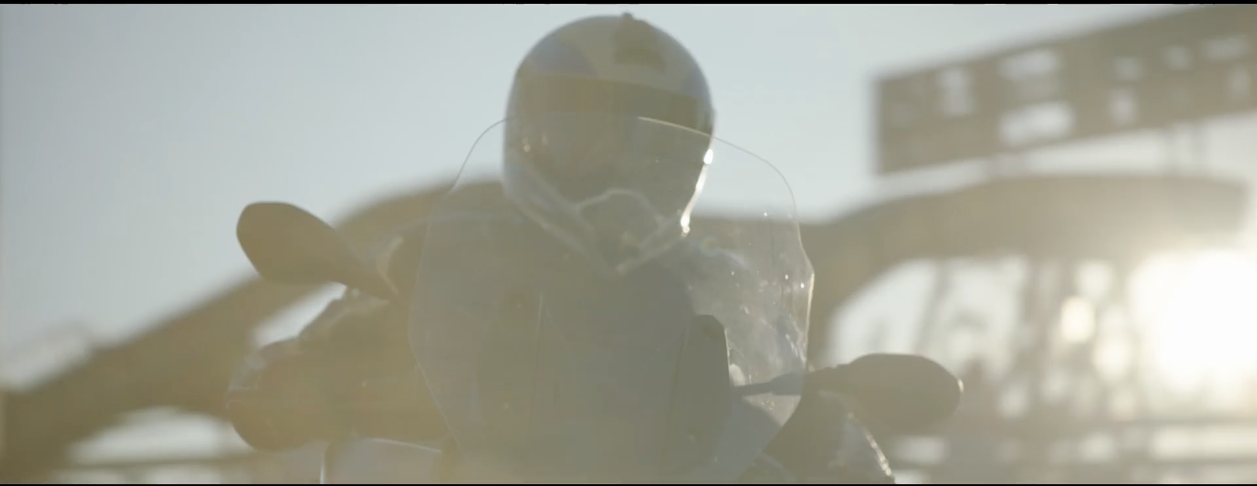 Stylish image of a man riding his motorbike in a BMW Motorrad commercial, filmed on location in Genoa, Italy, with cinematography by Callan Green ACS NZCS