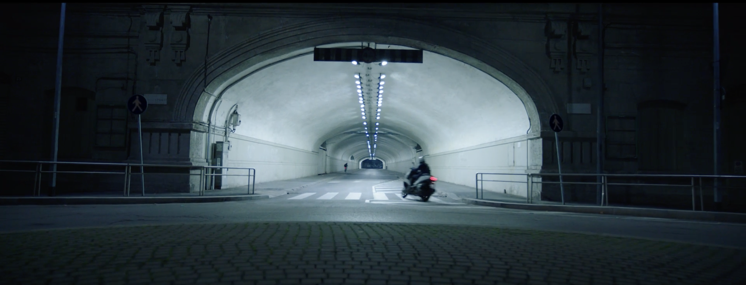Stylish image of a man riding his motorbike in a BMW Motorrad commercial, filmed on location in Genoa, Italy, with cinematography by Callan Green ACS NZCS