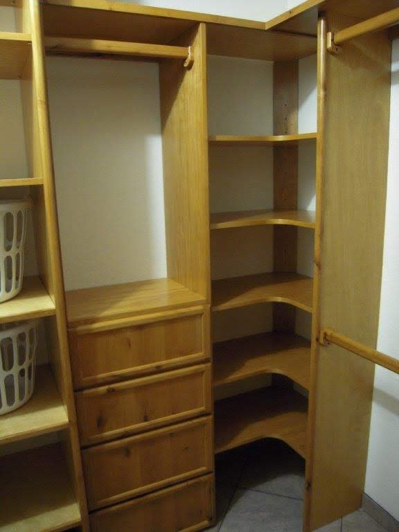 Alder & Birch, crafted to client specs and stained/ All shelves are full adjustable. Phoenix, AZ