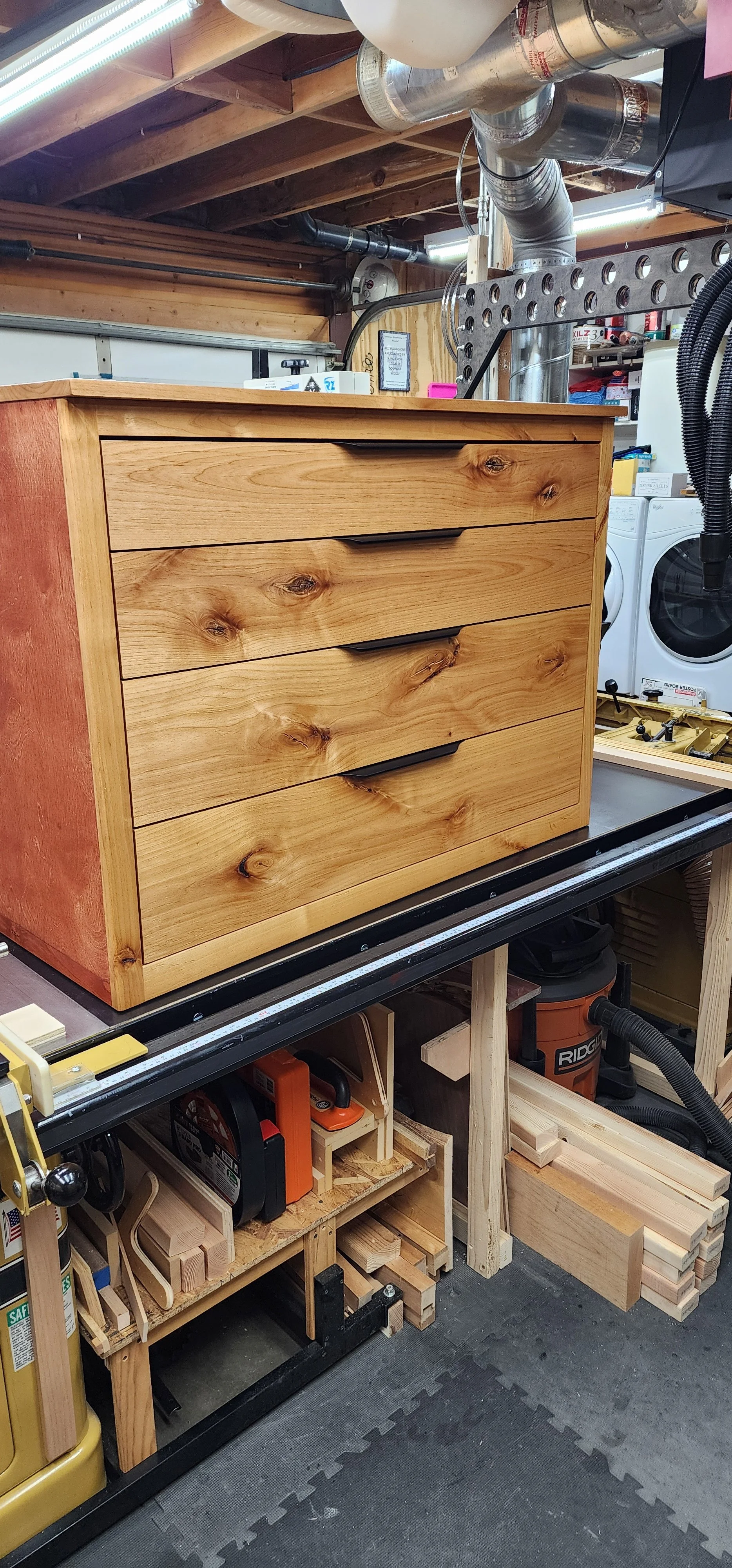 Knotty Alder dresser #1 with birch stained cases and birch drawers. In the shop.