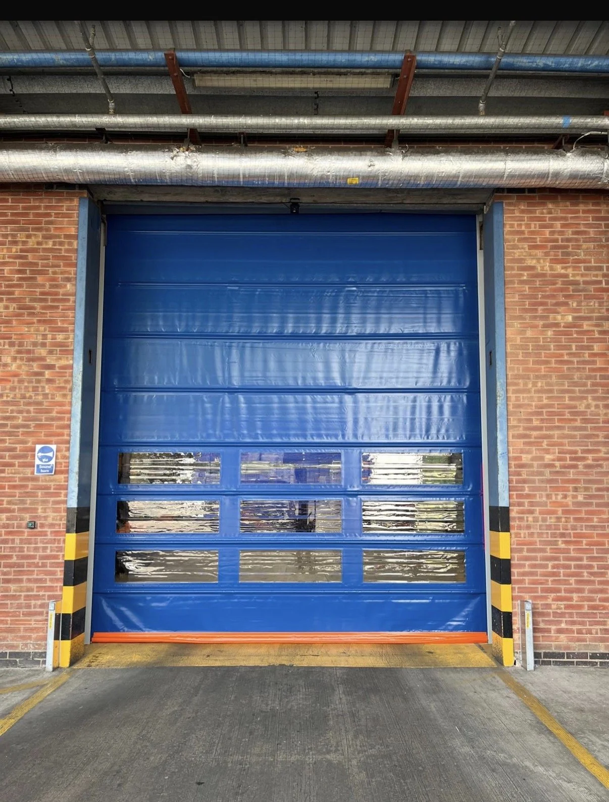 Why High-Speed Doors Are the Smart Choice for Leicestershire and midlands Businesses During a Heat Wave