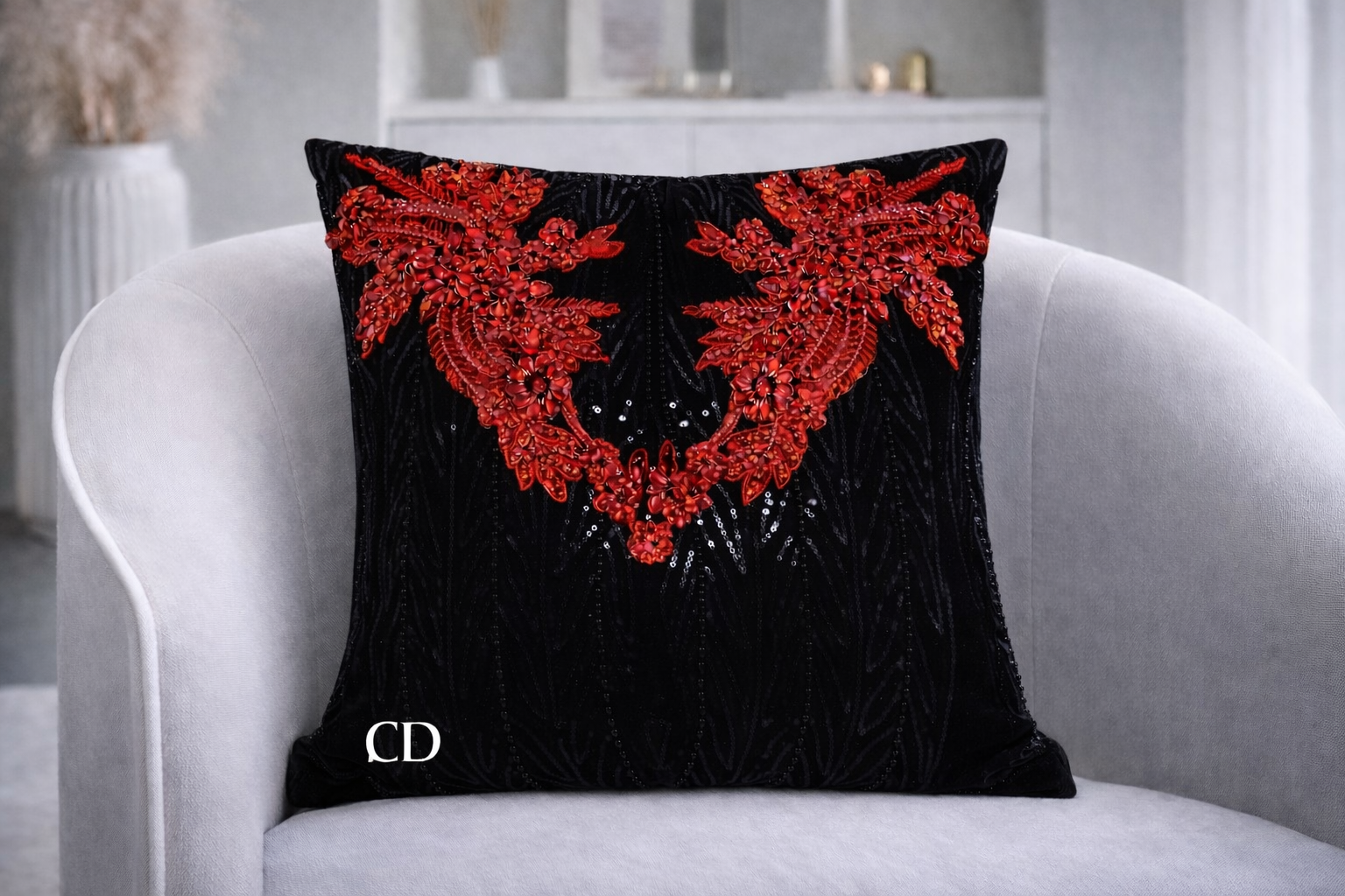 HAILEY'S QUINCEAÑERA 
Cocoa Desireé Studio 
Created to celebrate a young woman's quinceañera, this piece was inspired by the rich red and black tones of her celebration gown. 
Designed as a keepsake, the pillow preserves the beauty of that day within