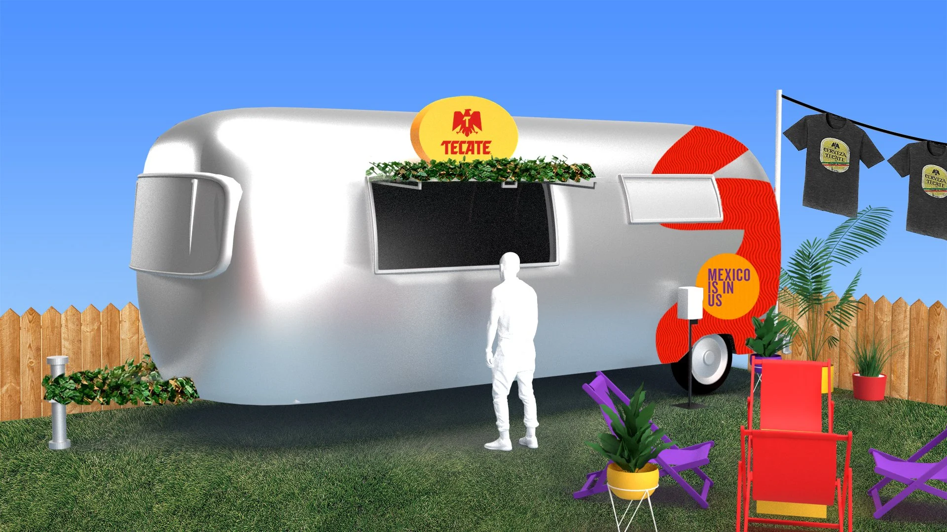 Una caravane plateada decorada con vegetación, cartel de Tecate y la inscripción 'México in US', rodeada de plantas, sillas y ropa colgada, en un espacio al aire libre