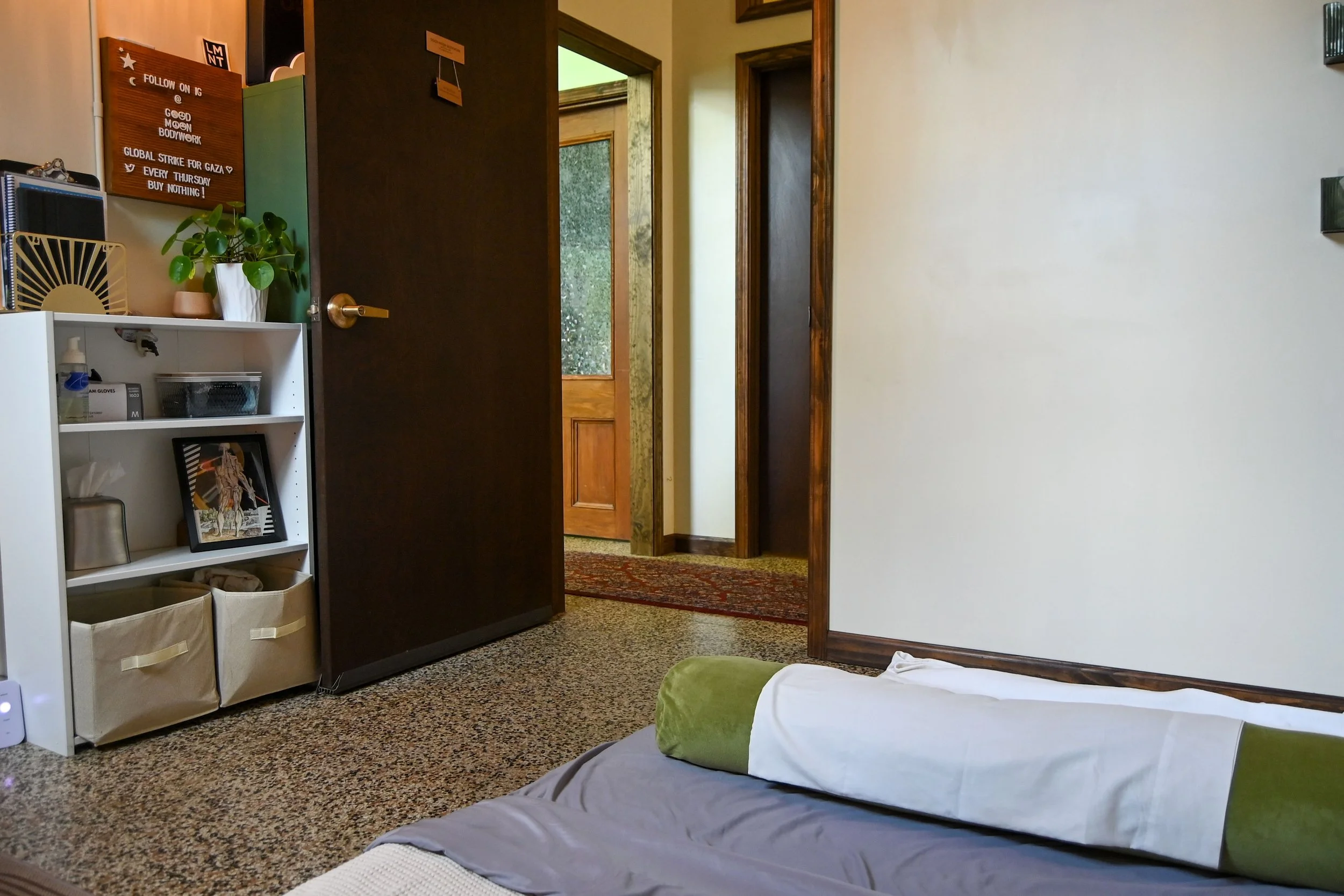 TREATMENT ROOM: Set up for larger clients or those for whom floor mat work is preferred.