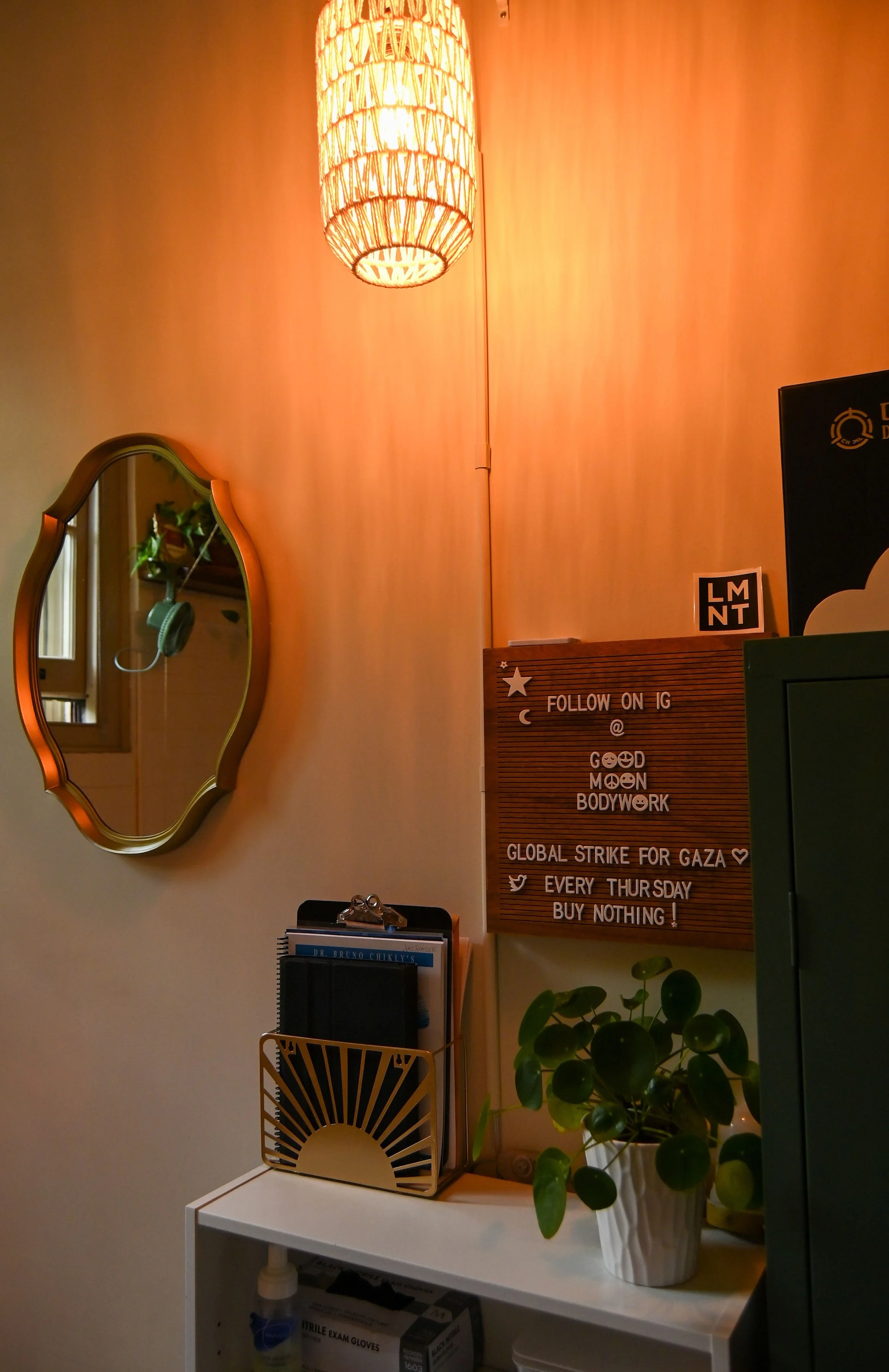 TREATMENT ROOM: Bulletin board, mirror, soft dimmable lighting, glass cupping set