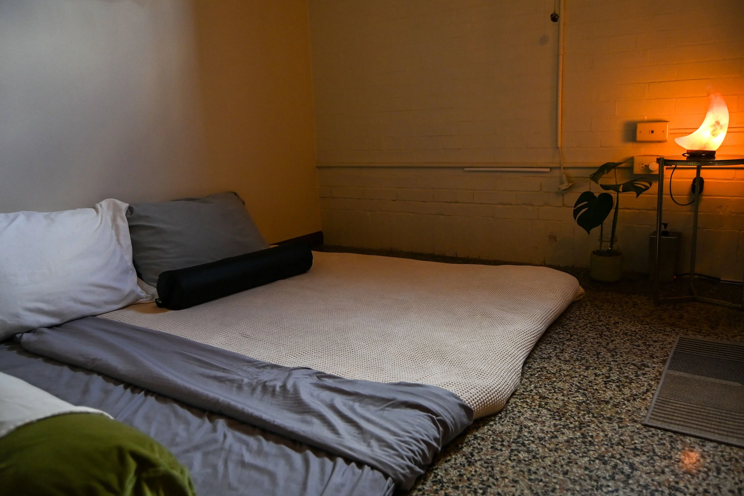 TREATMENT ROOM: Set up for larger clients or those for whom floor mat work is preferred.