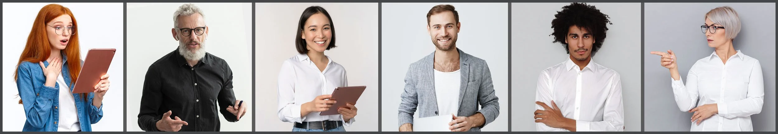 Six people standing in front of a plain light gray background, each with a different expression and pose, including a woman with red hair and glasses looking surprised at a tablet, a man with gray hair and beard with glasses gesturing with his hand, a woman with black hair smiling and holding a tablet, a man with short brown hair and beard smiling and holding a paper, a man with curly darker hair crossing his arms, and a woman with short gray hair pointing at the woman next to her.