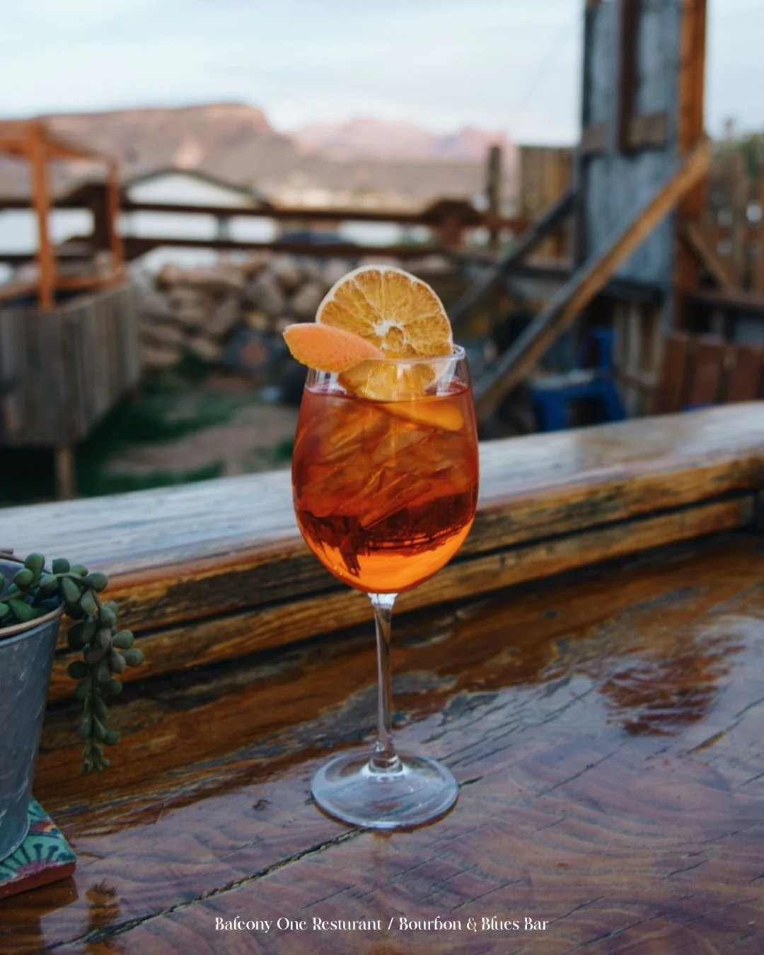 Warm evenings at our Bourbon &amp; Blues Bar call for something cool and bright. 🍊🌅

An Aperol Spritz, chilled just right, sparkling over ice with fresh citrus and desert air in the background. The kind of drink that turns a quick stop into a slow 