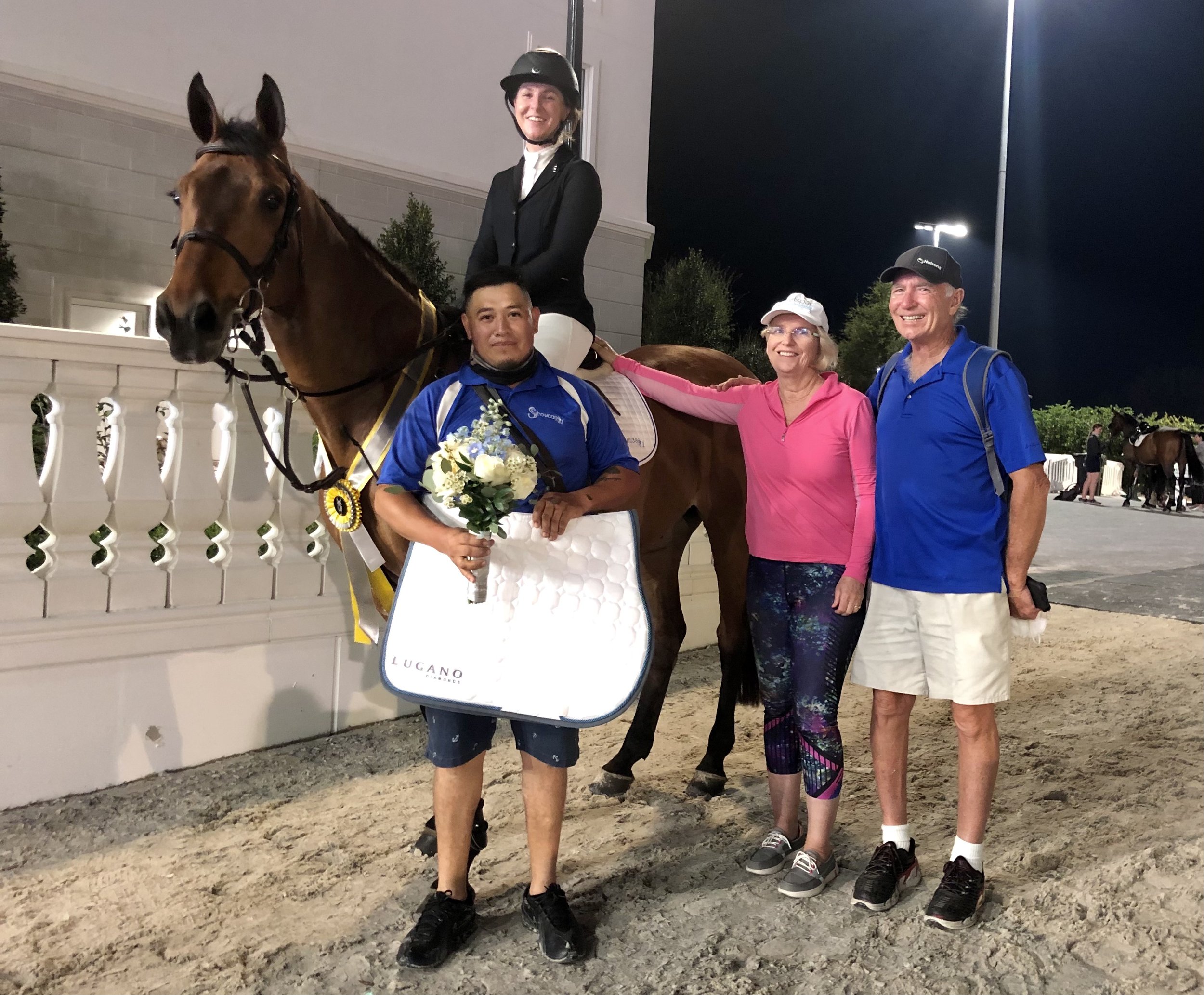 Cinven CR (Cilantro) with rider and team, wearing a prize rosette.