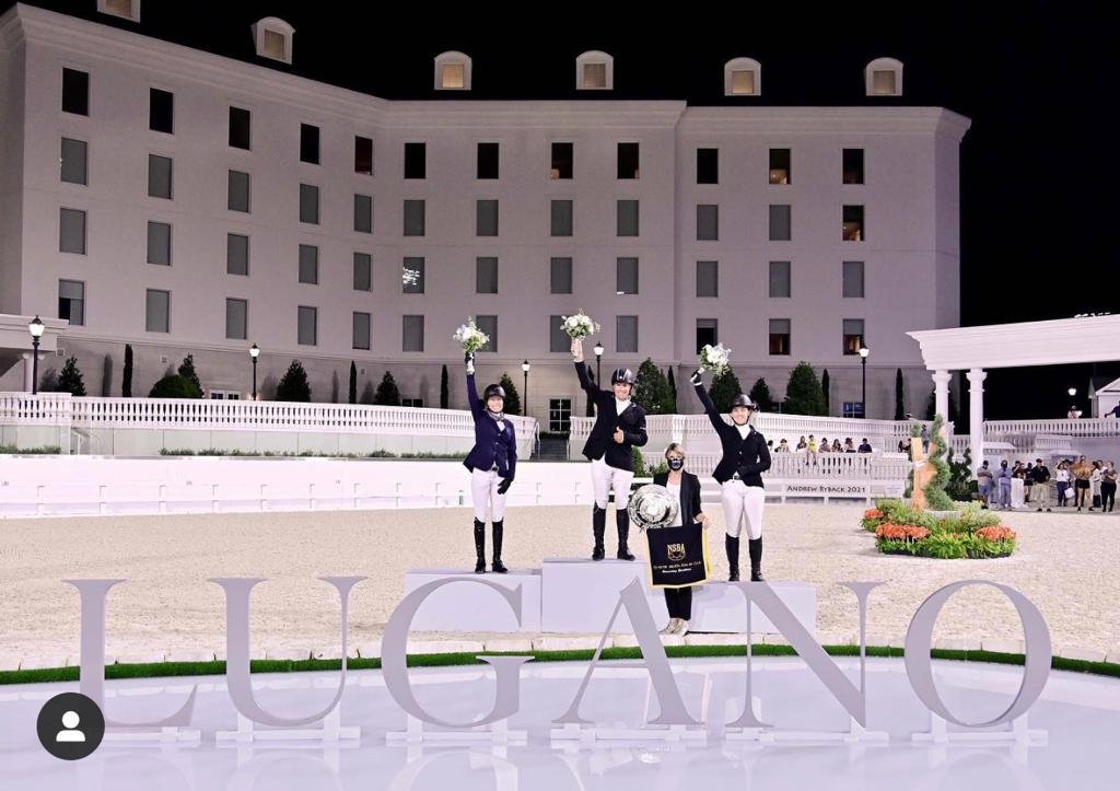 Bryn Sadler and Aaron Vale on the podium at the Lugano Grand Prix at WEC Ocala, Florida