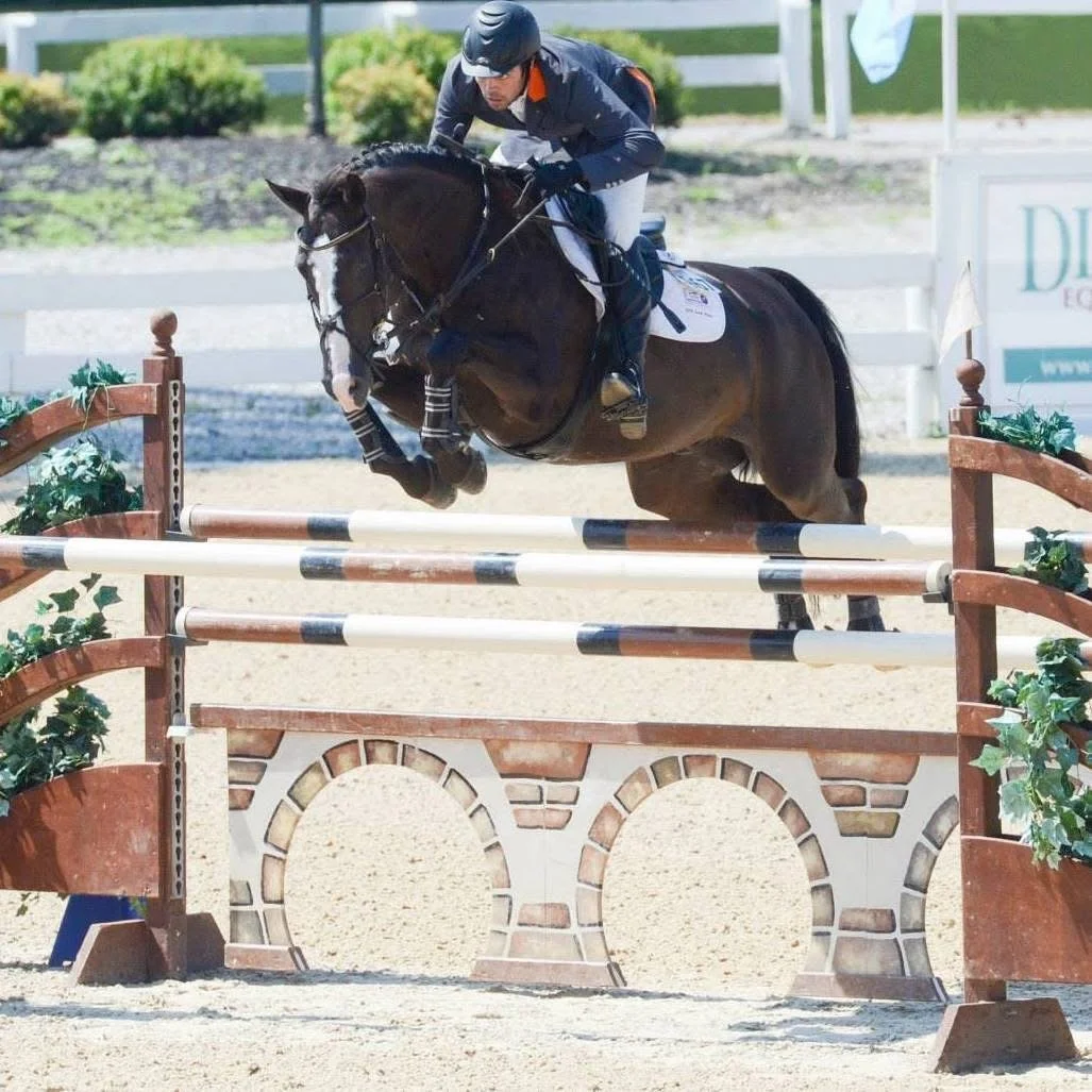 Ryan Genn competing in a Grand Prix at the Great Lakes Equestrian Festival in Michigan
