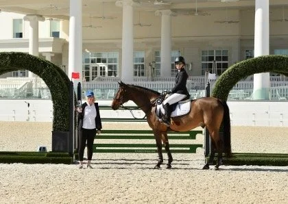 Bryn Sadler and Wendy Haig in the victory presentation for the 1.45m Classic at WEC Ocala Grand Arena, Florida